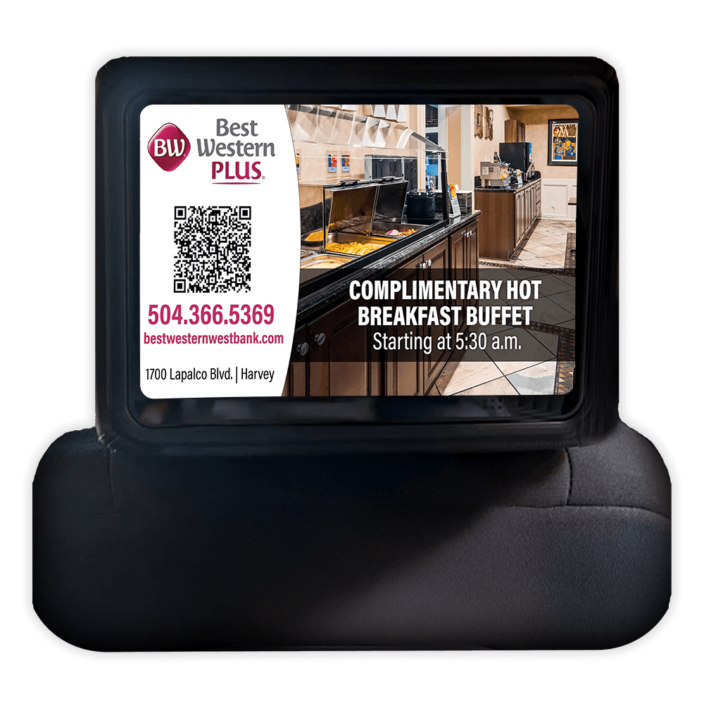 A person touching a MotionMedia in-vehicle advertisement.