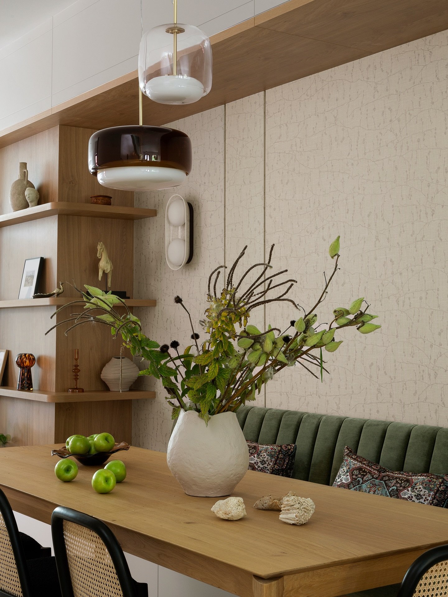 An empty wall. That&rsquo;s all it was. Now it&rsquo;s the heart of the home- where the family gathers, meals are shared, and memories are made.
We designed a custom banquette for that wall, and it transformed the entire energy of the space: intimate