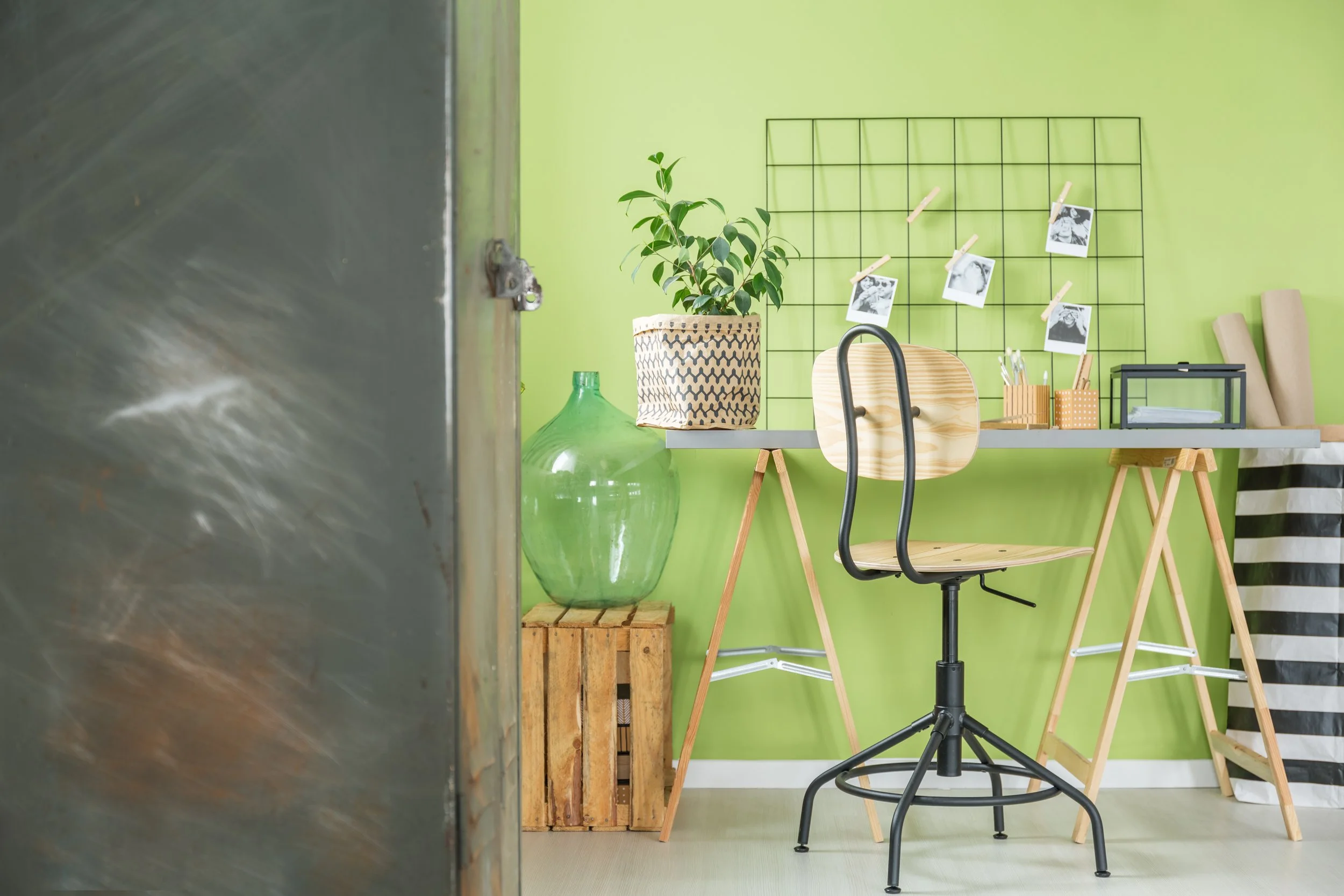 Green workspace with industrial stool