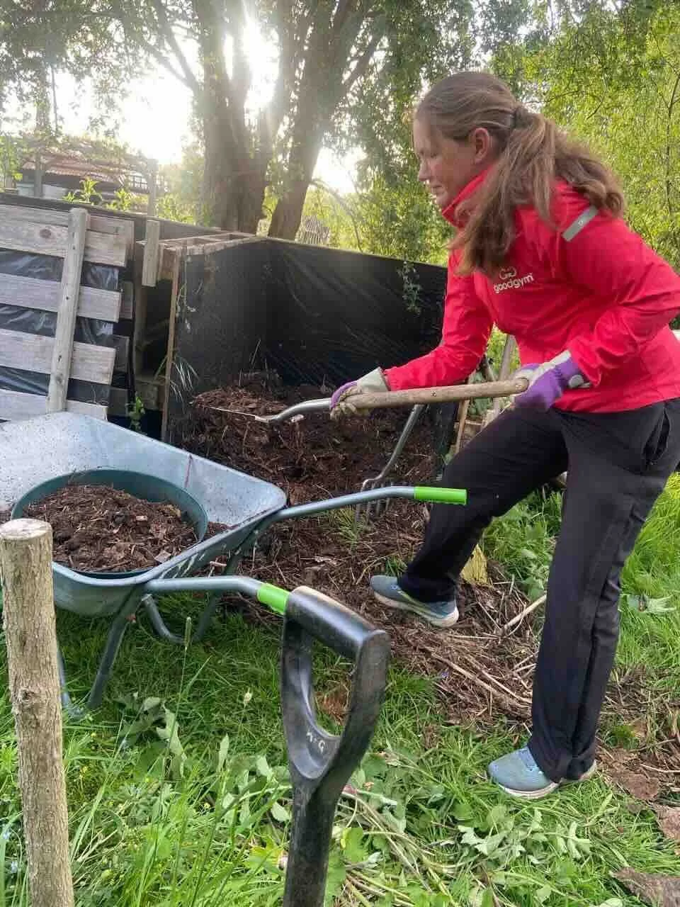 2026-05-26 GoodGym moving compost with wheelbarrow.jpeg