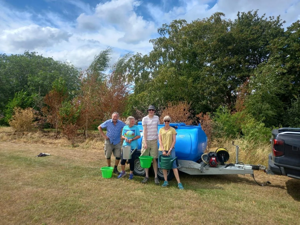 Marston community rallies to save young woodland after summer blaze