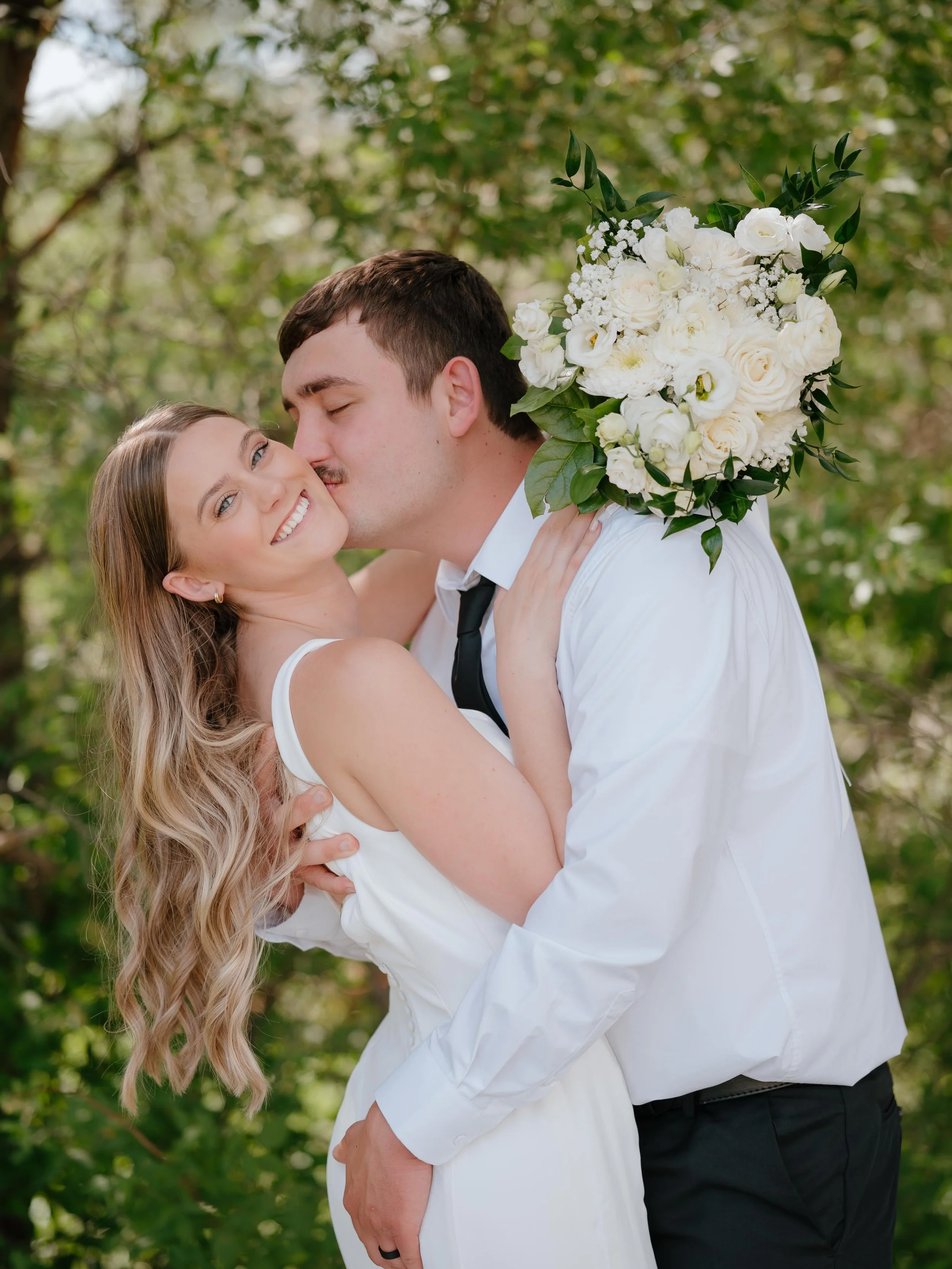 From meeting each other in middle school to becoming husband and wife. Sending the biggest congratulations to Mr. &amp; Mrs. Bradfield!🤍

Photographer: @bellafibranzphoto 
Dress: @maggiesotterodesigns 
Venue: Knights of Columbus
Florals: @sugarbeets
