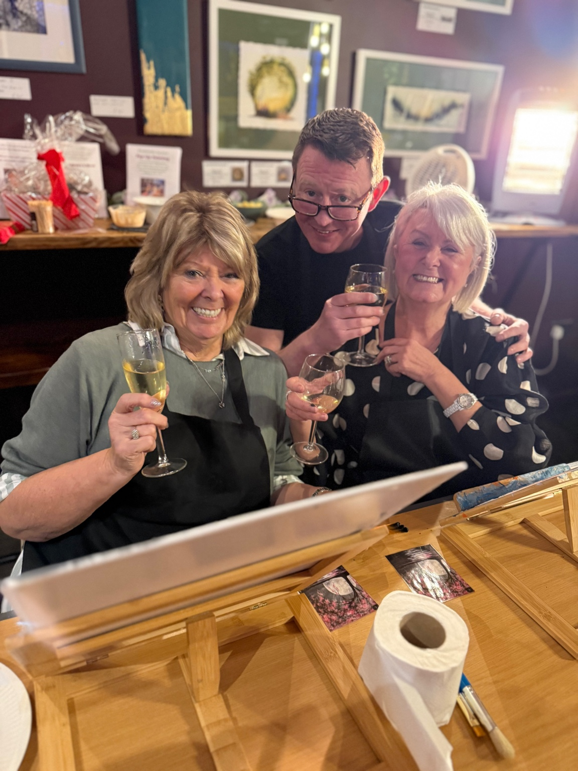 Guests enjoying a Canvas & Cava paint and sip night in Brighouse with host John Murphy of Czerwik Fine Wines & Cheeses. A relaxed, guided painting experience with drinks, social atmosphere, and step-by-step instruction, showing why Canvas & Cava is o