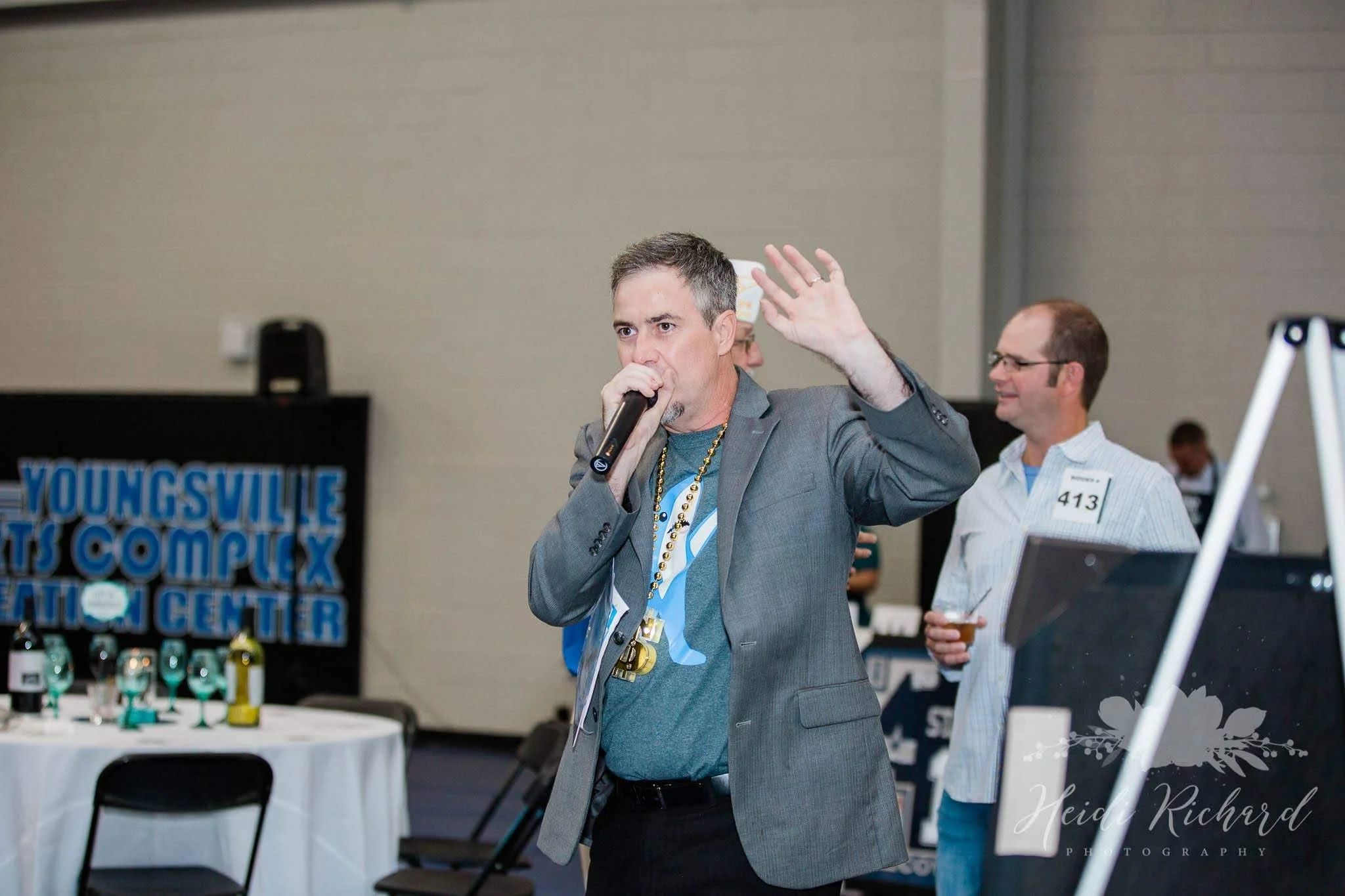 Brian Campbell, from Impact Acadiana, providing auctioneer services.