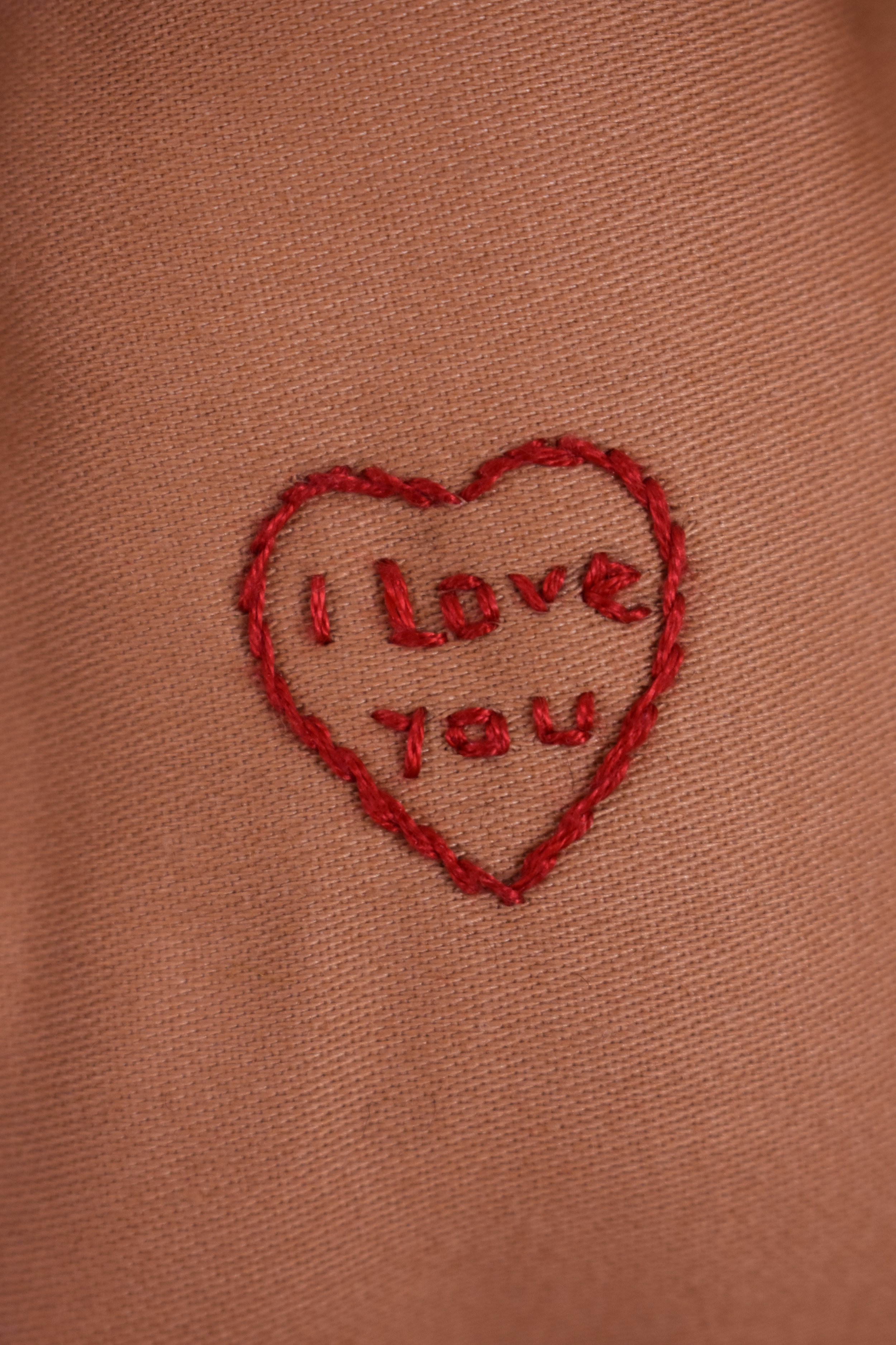 Raggedy Ann dolls all have hearts that say "I love you"