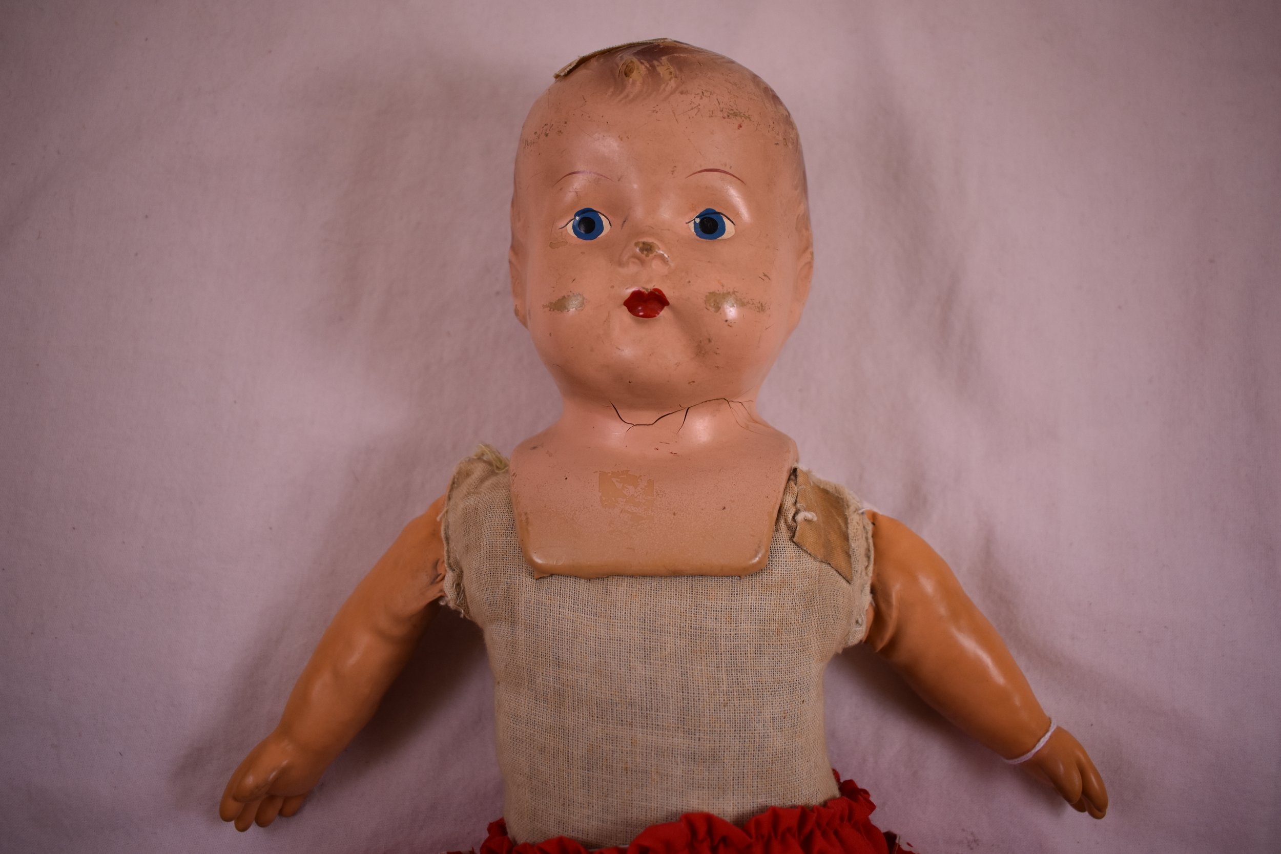 The magic skin hand in context on the doll itself. The head is composition.