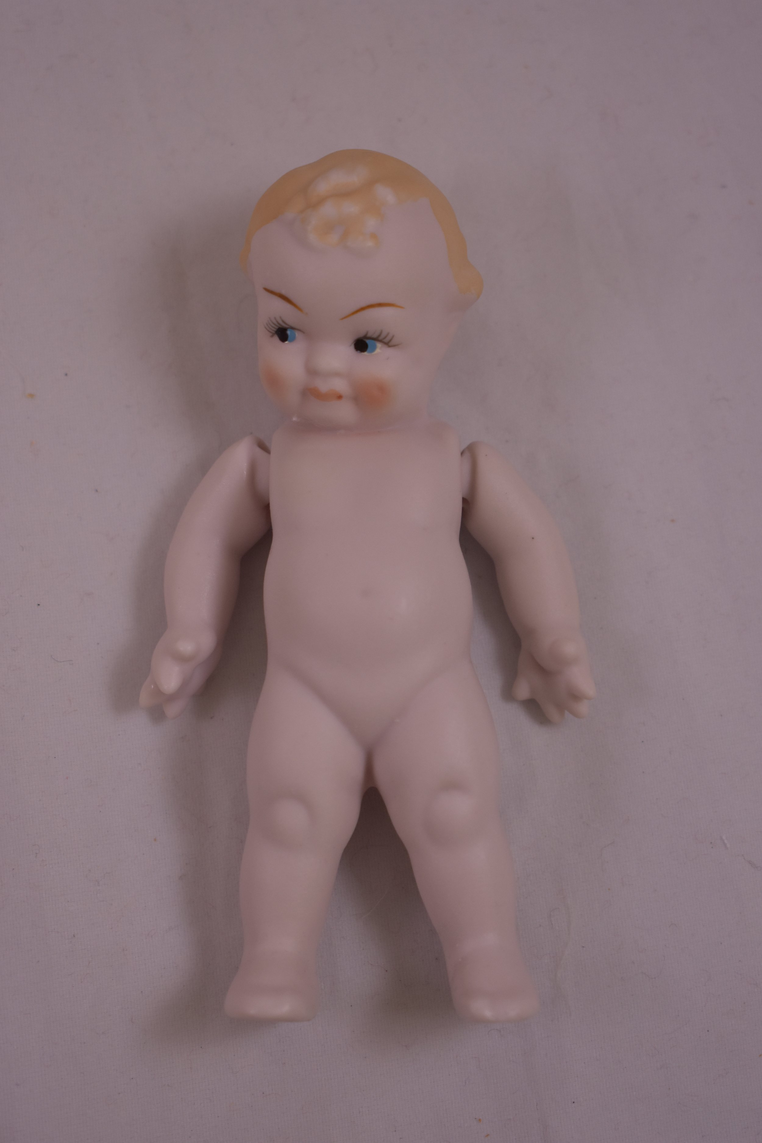 As seen earlier, a bisque boy.