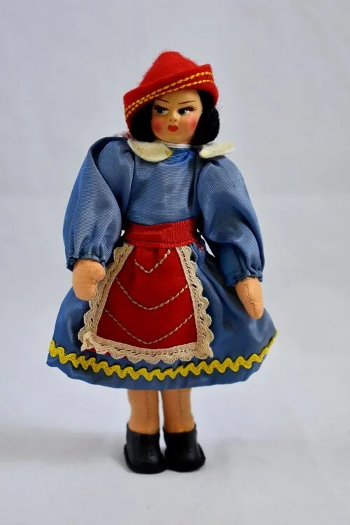 Girl in traditional Polish dress, made in Italy