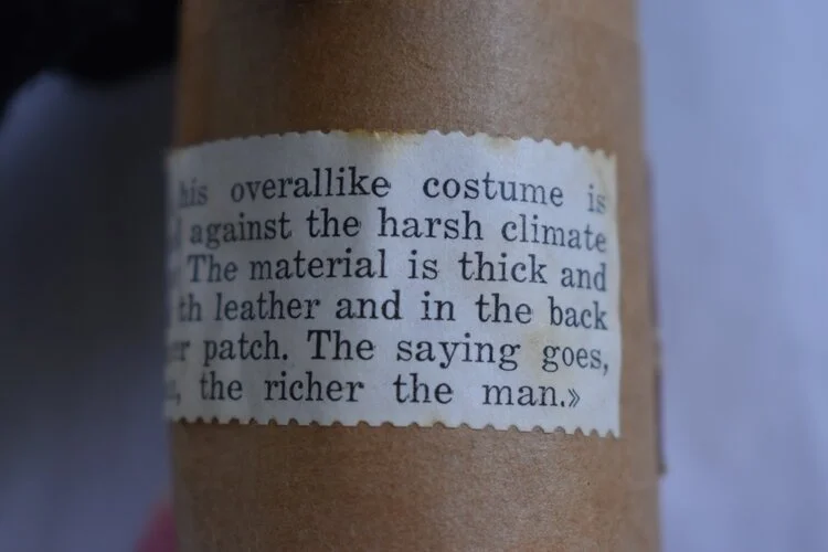 Hilda S. Ege doll wisdom statement "The bigger the patch, the richer the man"