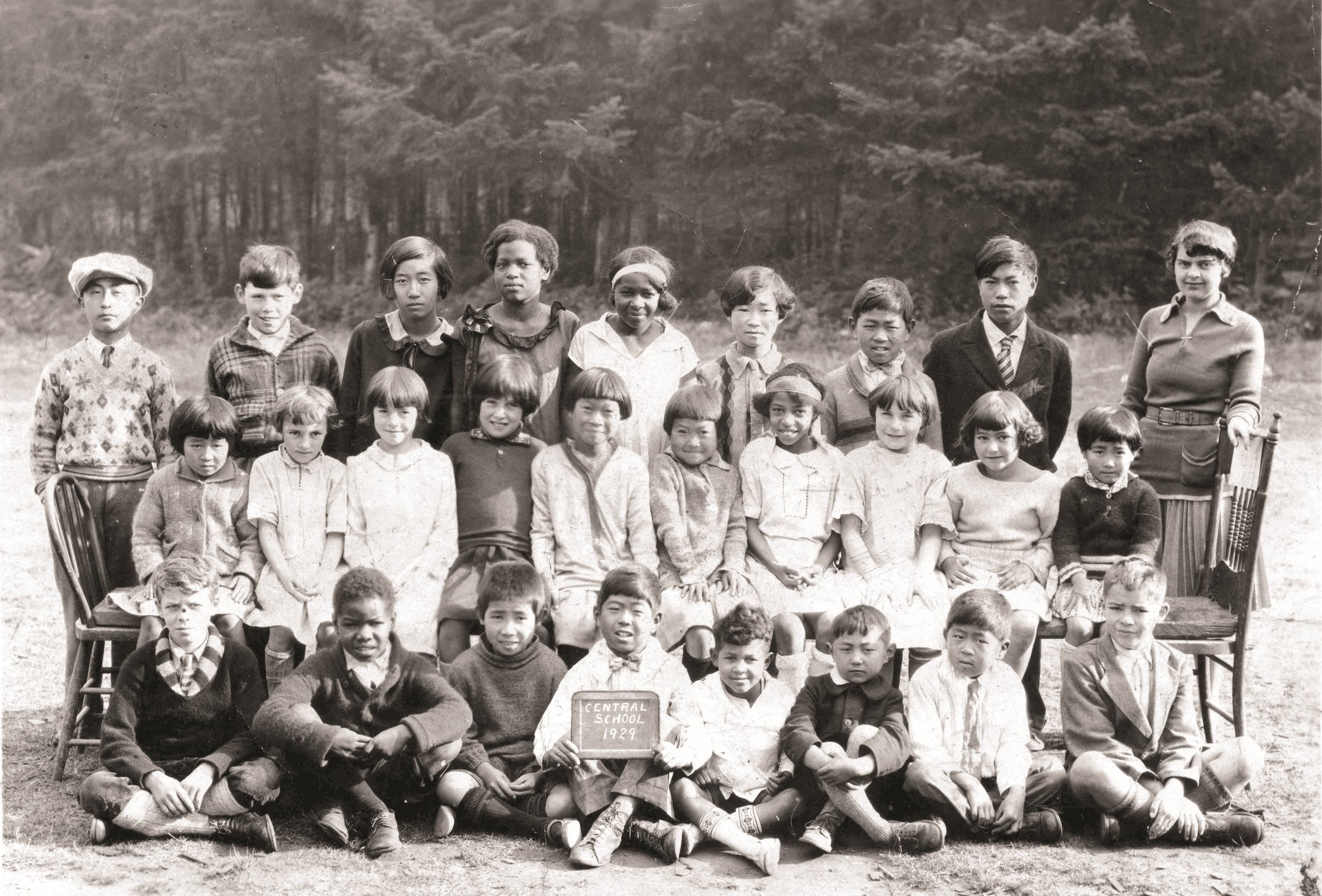 A 1929 school picture from Central School on Salt Spring Island. It is thought that Eve, Gladys and Jim Wood, as well as Leola and Fred Whims are in this photograph.  
Source: Salt Spring Island Archives, 2004032041 , Gwynne-Wood Collection 