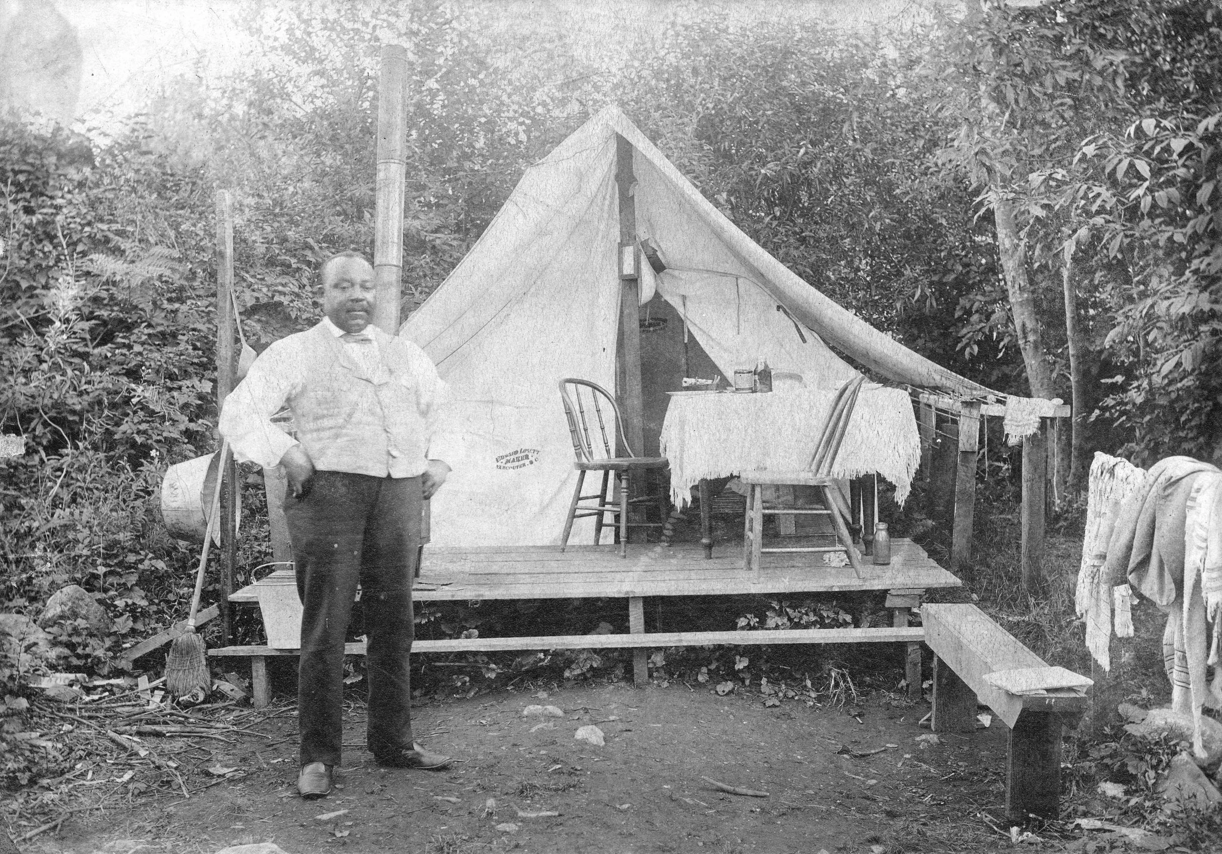 Joe Fortes standing in front of his summer residence at English Bay, circa 1890s
Source: City of Vancouver Archives, AM54-S4-: Port P1725