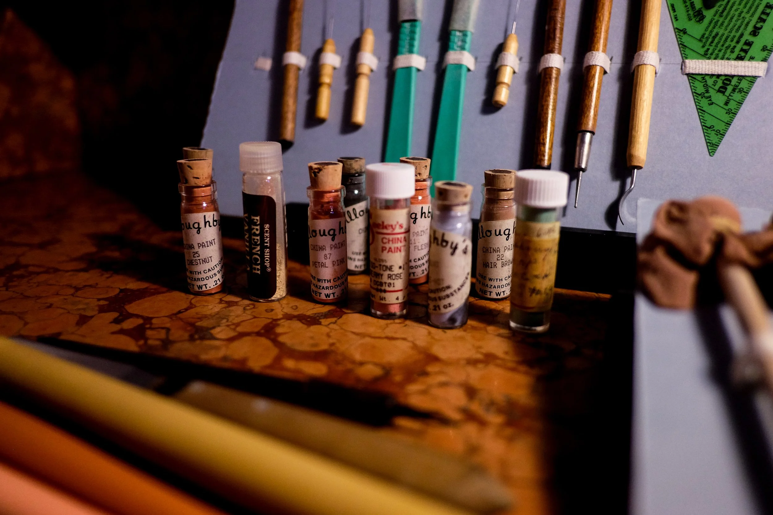 Paints used to paint porcelain dolls. Porcelain paints are dependant on whether or not the bisque is glazed. For glazed porcelain, the pigments used do not dissolve in water or oil, since they are made of a blend of metallic oxides and powdered glass