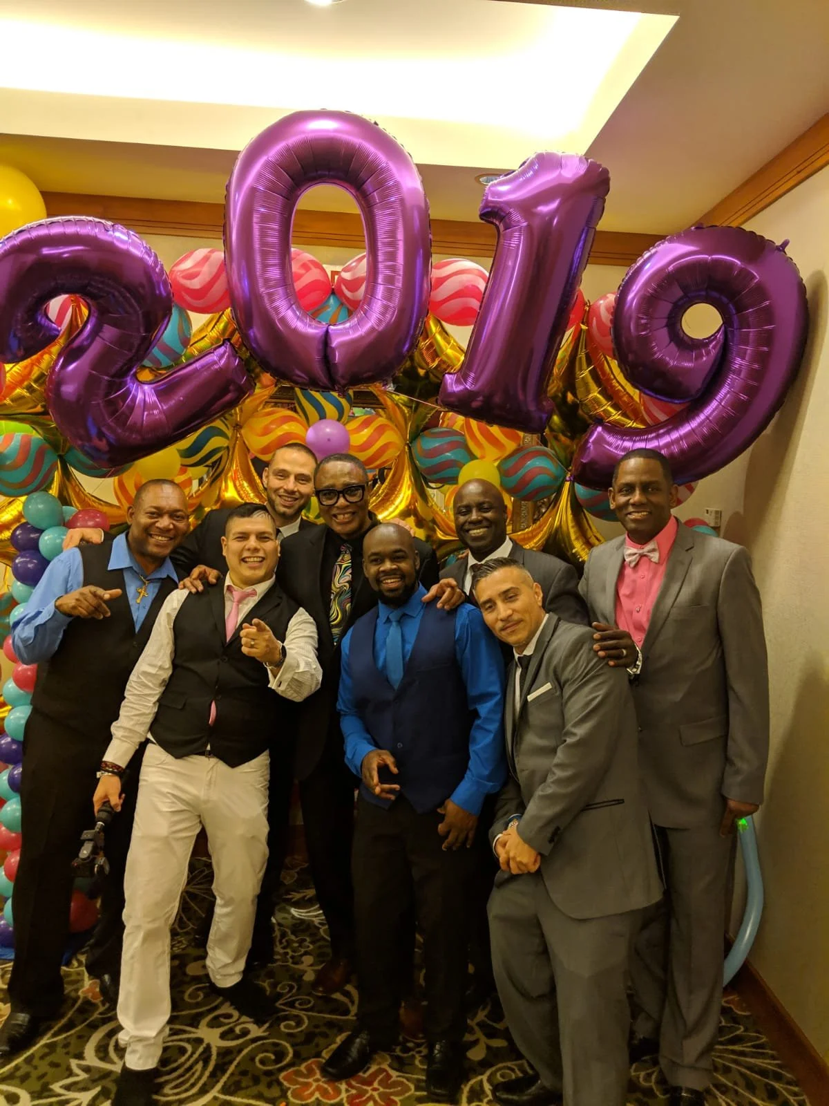 The team from Meloproductions, Mel’s promotions company, at their 2019 holiday party.