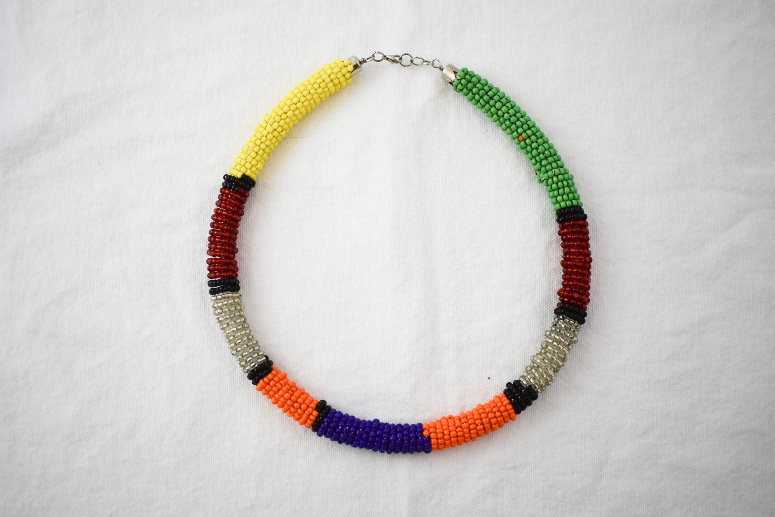 Beaded necklace from Zimbabwe. Beadwork is traditionally passed down from generation to generation as an oral tradition, in a form similar to an apprenticeship.