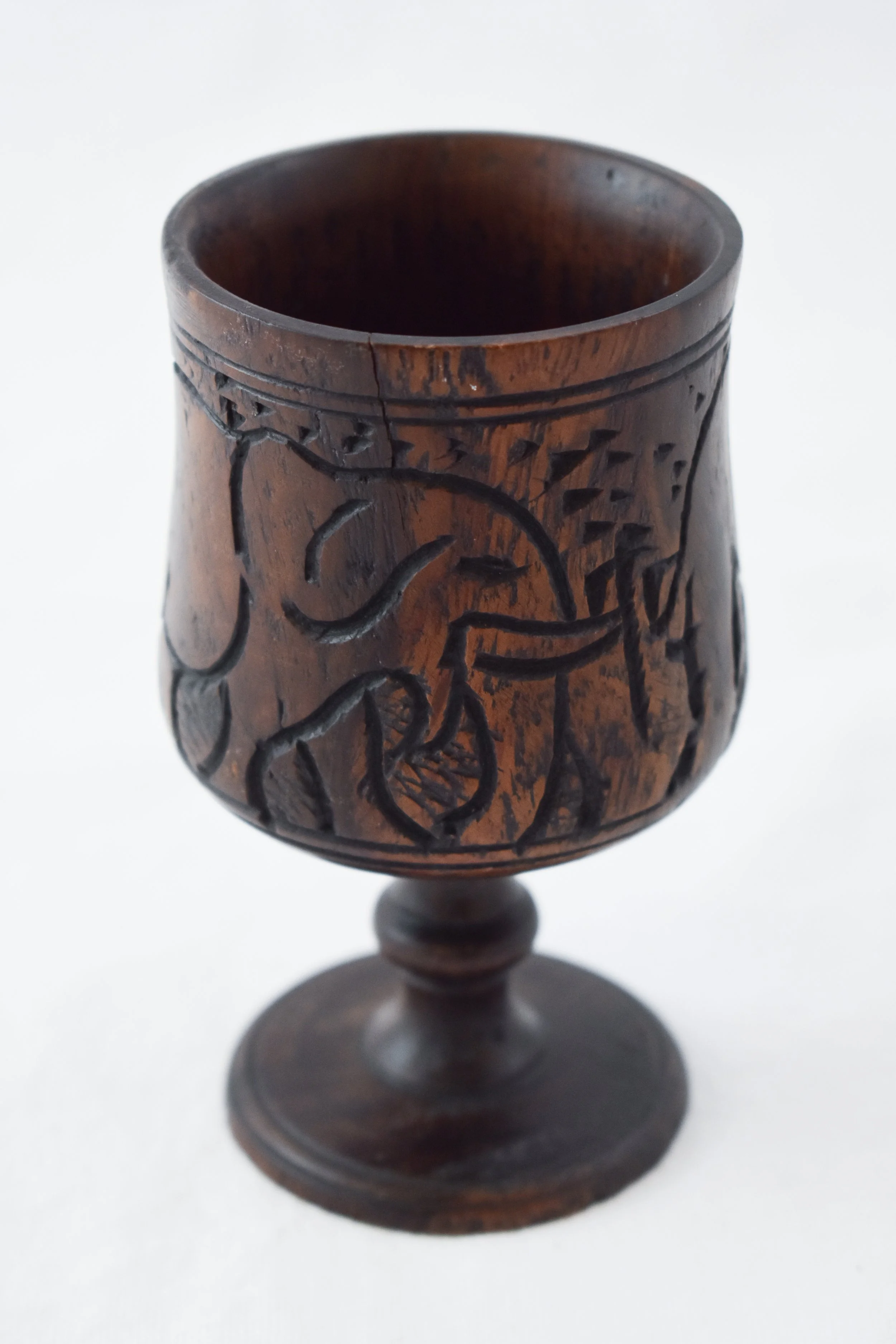 Wooden goblet most likely made out of mukwa (African teak) or mahogany, both common across the Southern Africa savanna, depicting an elephant. Zimbabwe has a robust population of African bush elephants, especially in the fertile western part of the c