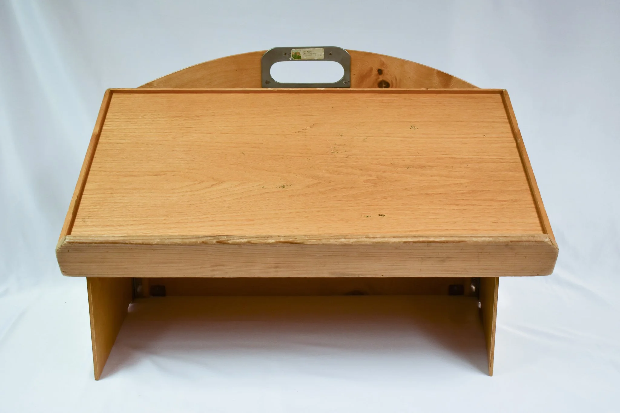 A portable lectern, set up as it would have been used by Candace at ITC.