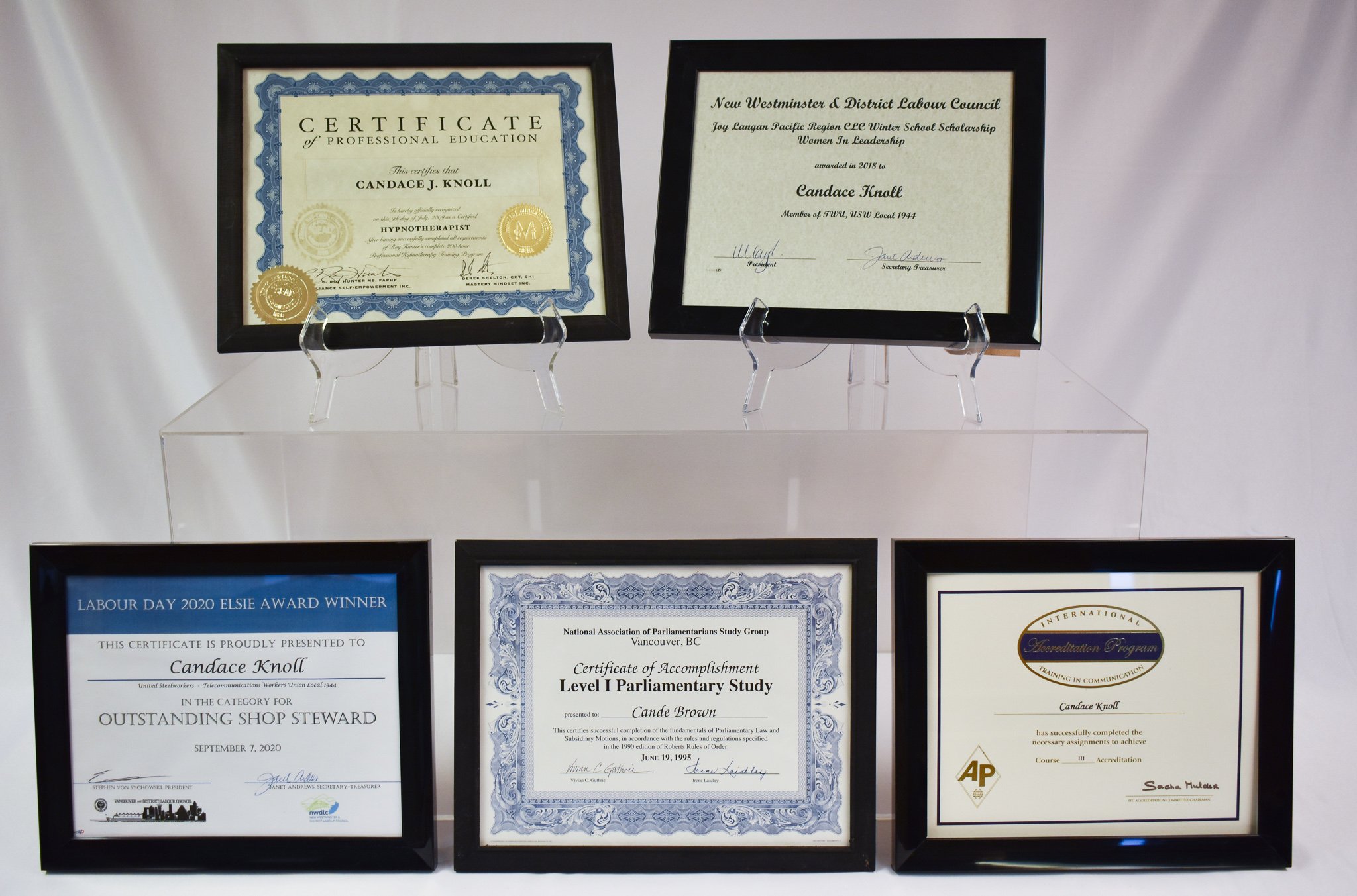 This items in this image are an abbreviated overview of Candace’s many accomplishments. Top row (L to R): Hypnotherapy certification; award from New Westminster & District Labour Council given to Candace for her leadership role in her union. Bottom r