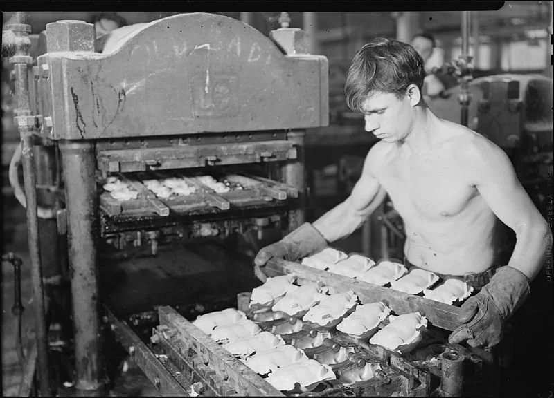 Mt. Holyoke, Massachusetts - Paragon Rubber Co. and American Character Doll. Pressing rubber doll bodies  at the Paragon Rubber Factory Co. and American Character doll, Massachusetts, between 1936 and 1937
Source: Wikimedia Commons