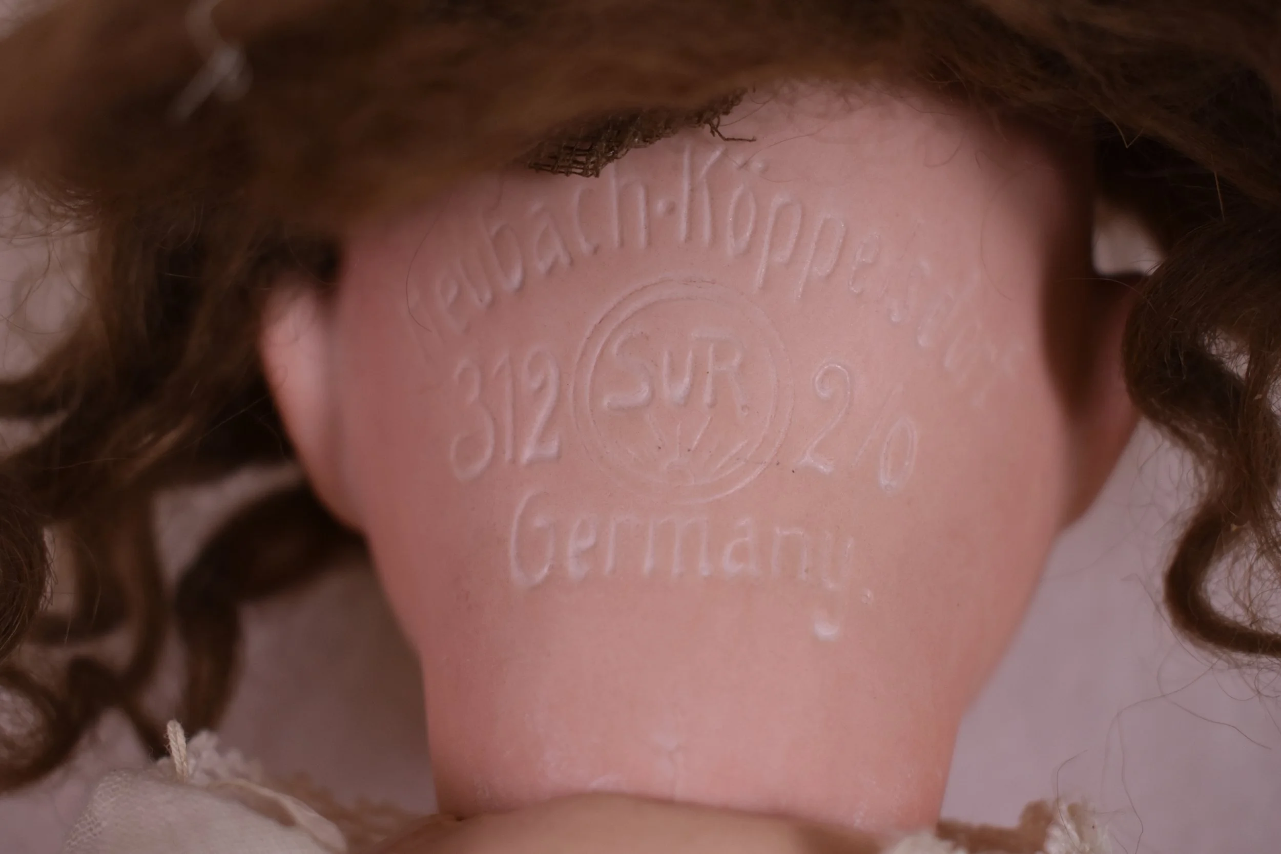 Gebruder Heubach doll trademark and mold number.