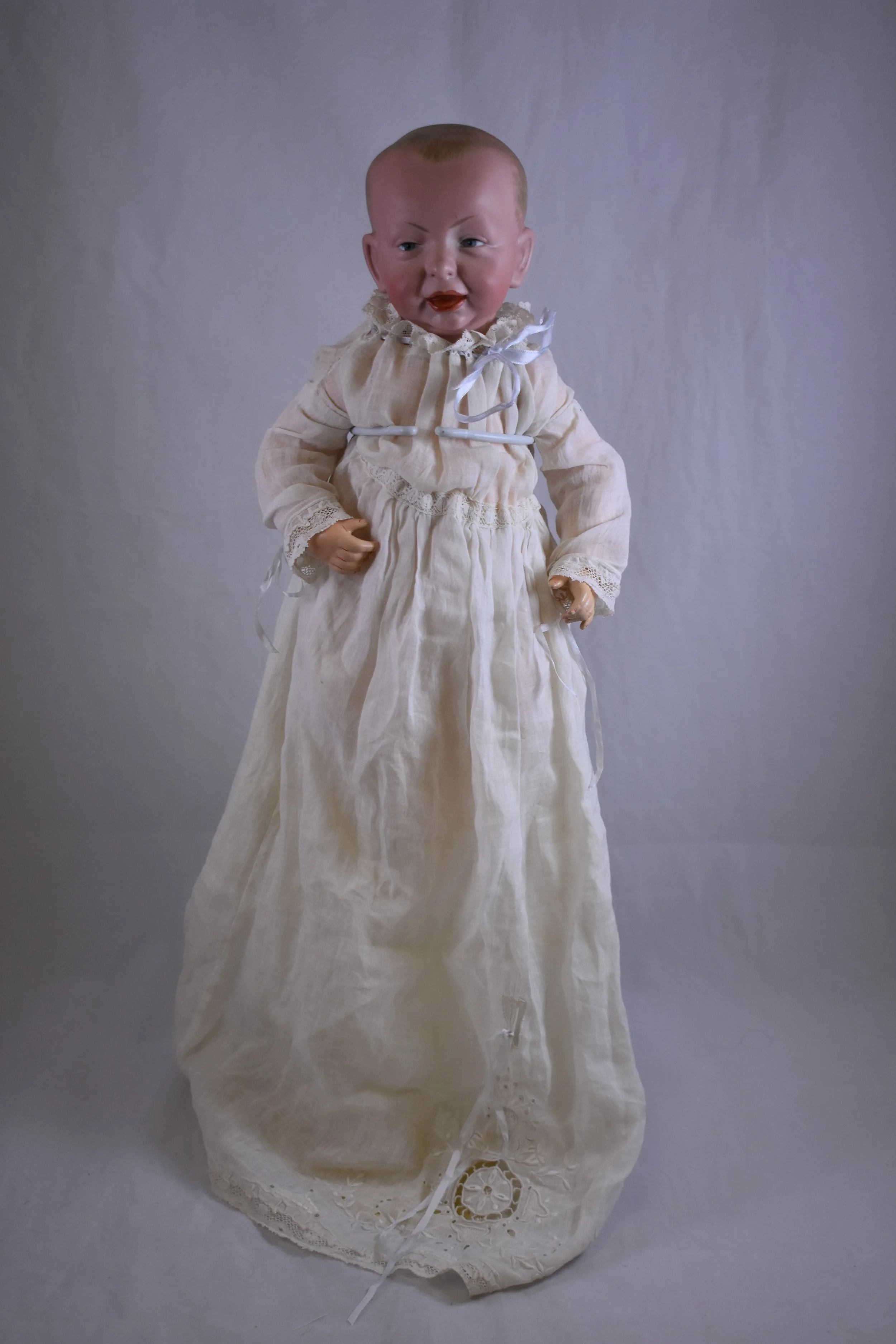 A Kammer & Reinhardt baby doll in christening gown