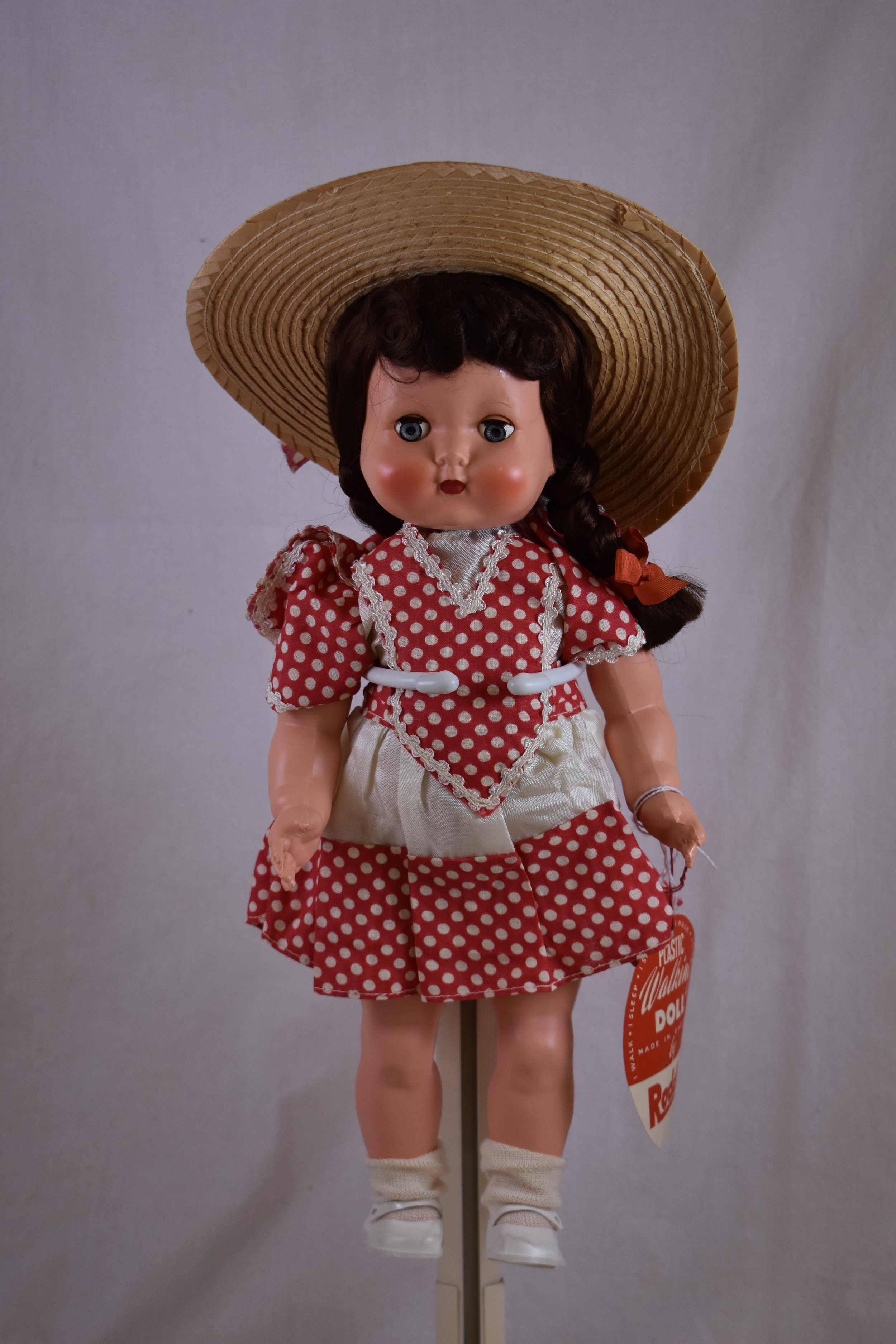 A “Roddy Doll,” made in England.  This plastic doll is a post-war doll. 