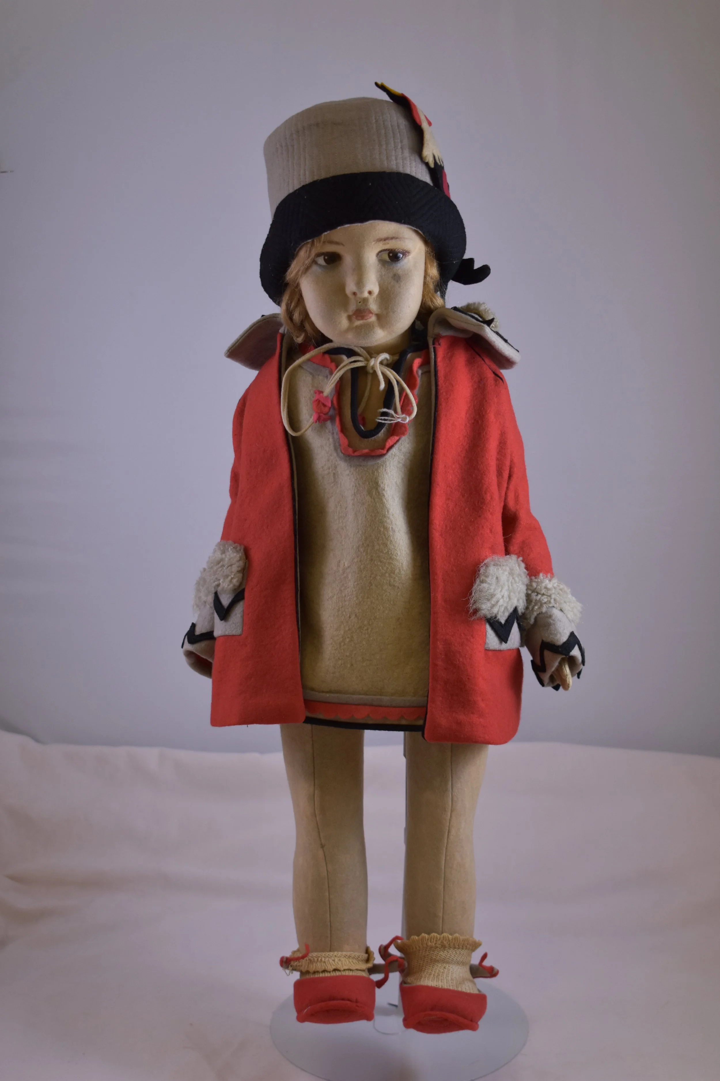 A well-dressed Lenci doll.