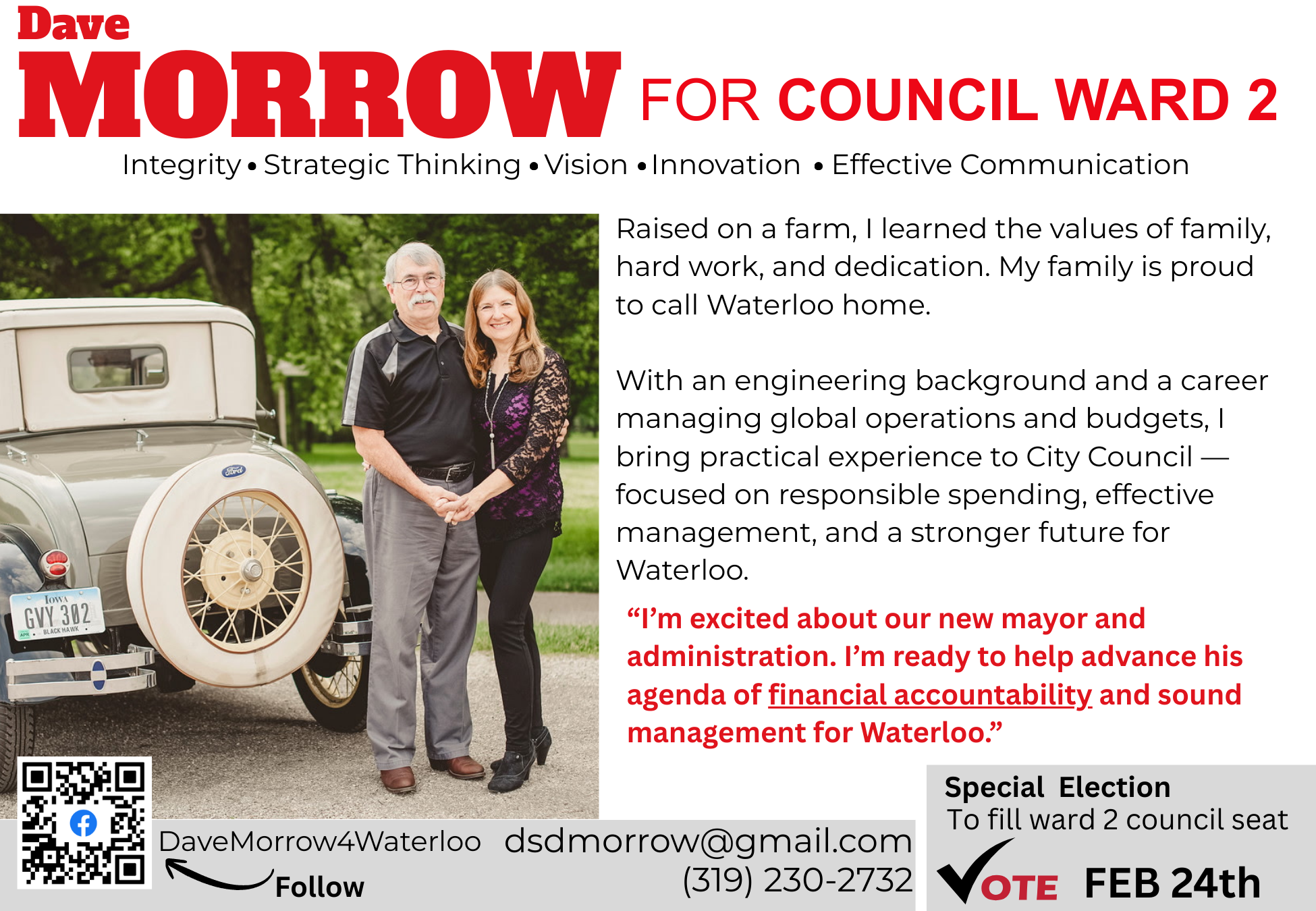 Photograph of a man and woman standing outdoors next to a vintage car, with green trees in the background. The man has gray hair, wears glasses, and is dressed in a black polo shirt and gray pants. The woman has long brown hair and wears a black lace top with purple accents and black pants.