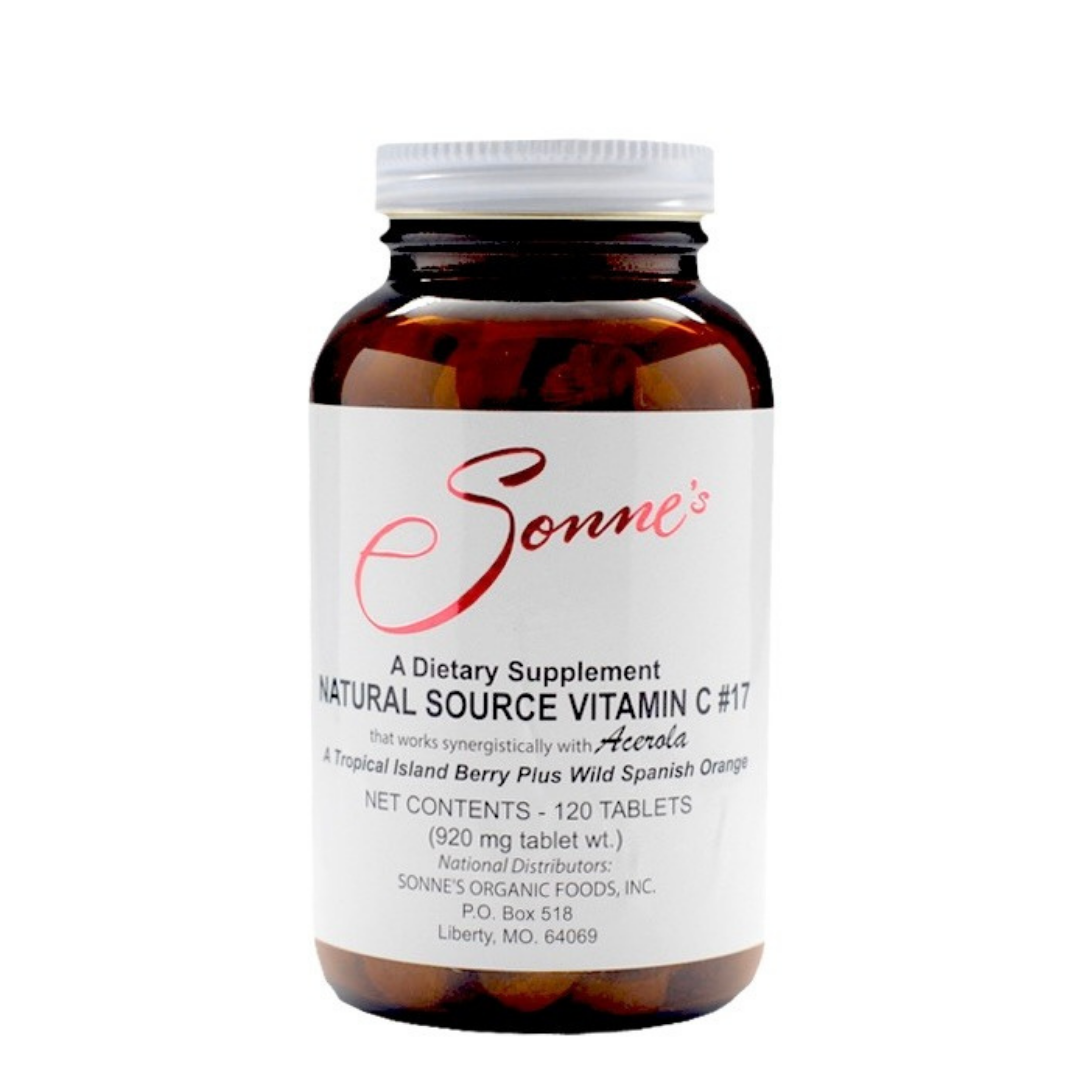 Bottle of Sonne's natural source vitamin C dietary supplement with tablets.