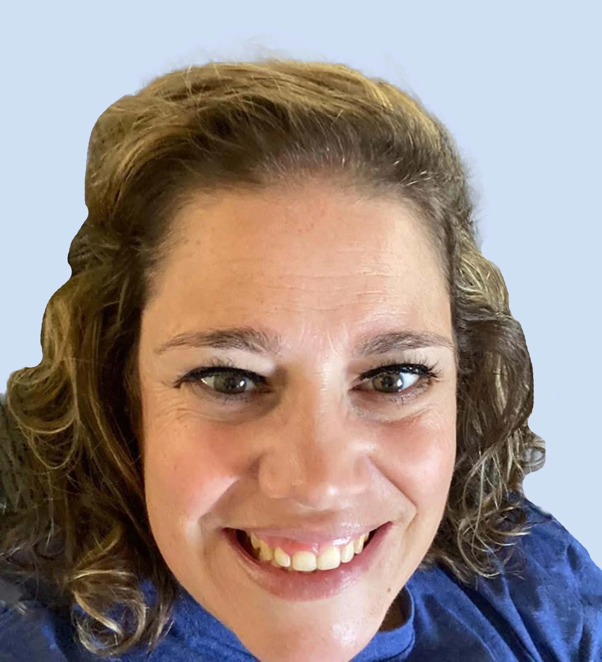 Board member Kourtney. Close-up of a woman with curly brown hair, smiling and wearing a blue shirt, against a light blue background.
