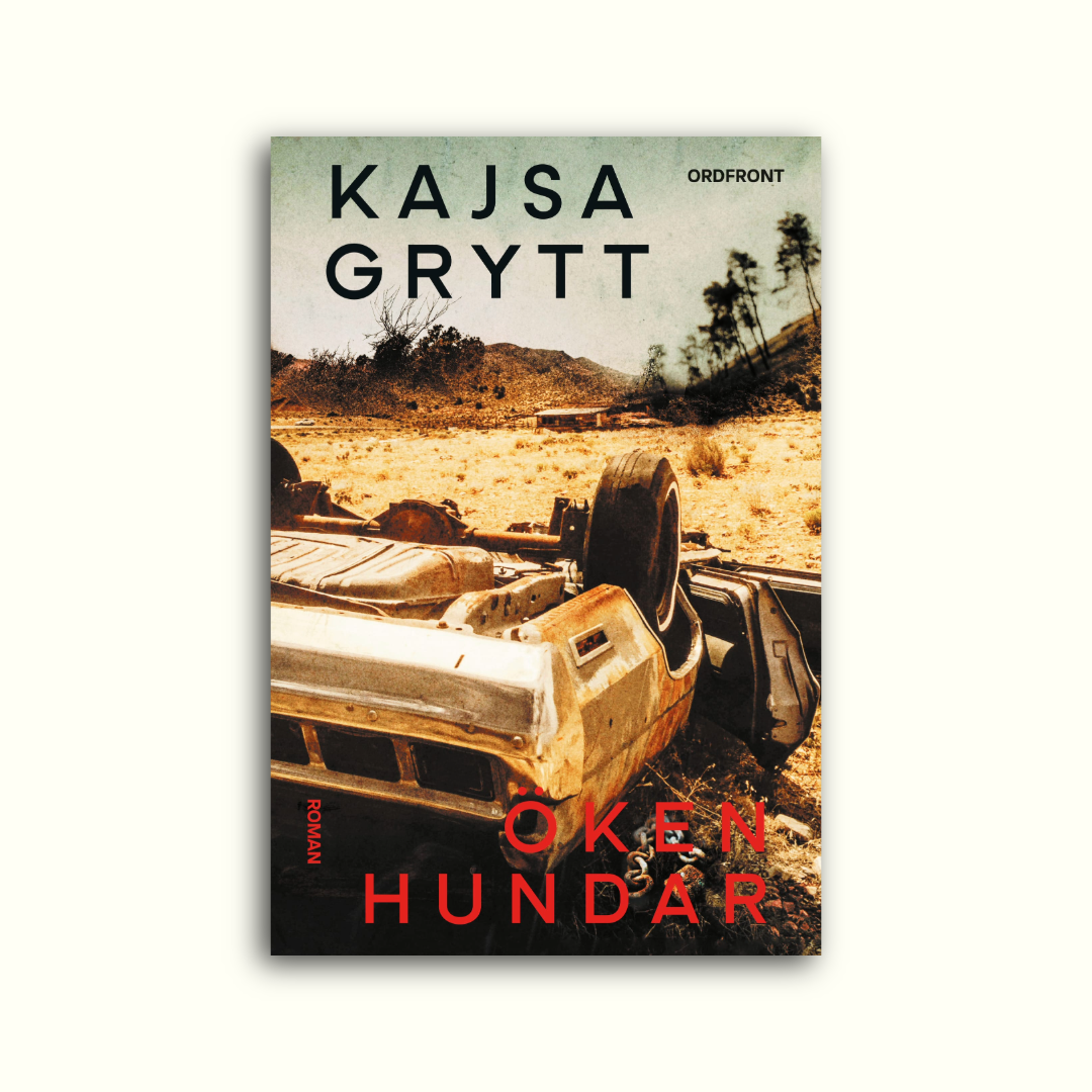 Book cover featuring an overturned, rusted car in a desert landscape with hills and sparse trees, with the title 'Kajsa Grytt' and author's name 'Oken Hundar' written on it.