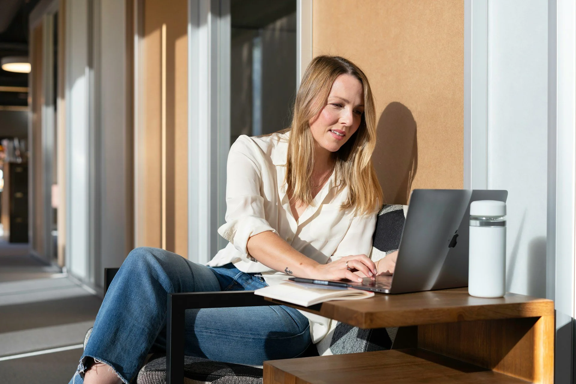 woman on laptop looking at screen