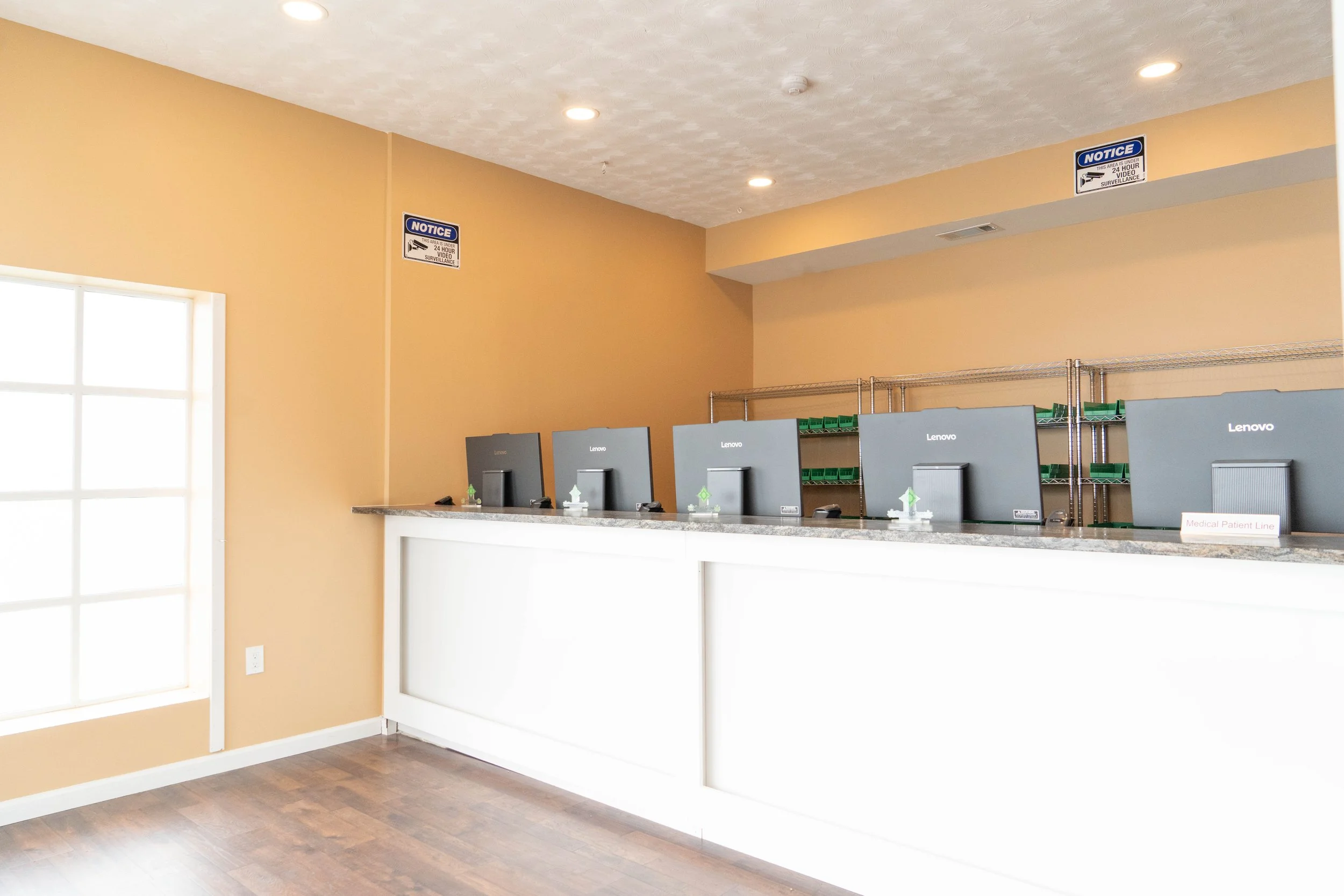 Inside Green Glow Dispensay - At The Dispensing Area Looking Towards The Counter With Register Stations