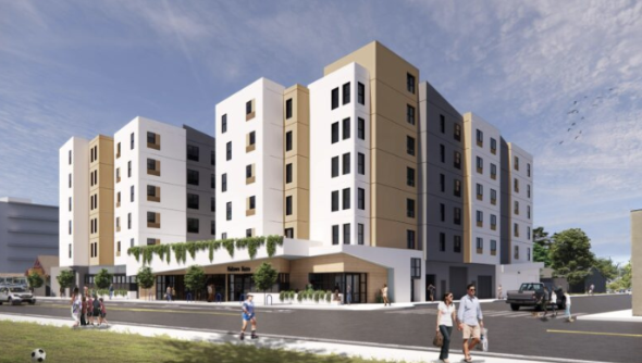 A modern multi-story residential building with retail spaces on the ground floor, surrounded by a sidewalk with pedestrians, cars parked nearby, and a small grassy area with children playing, under a partly cloudy sky.