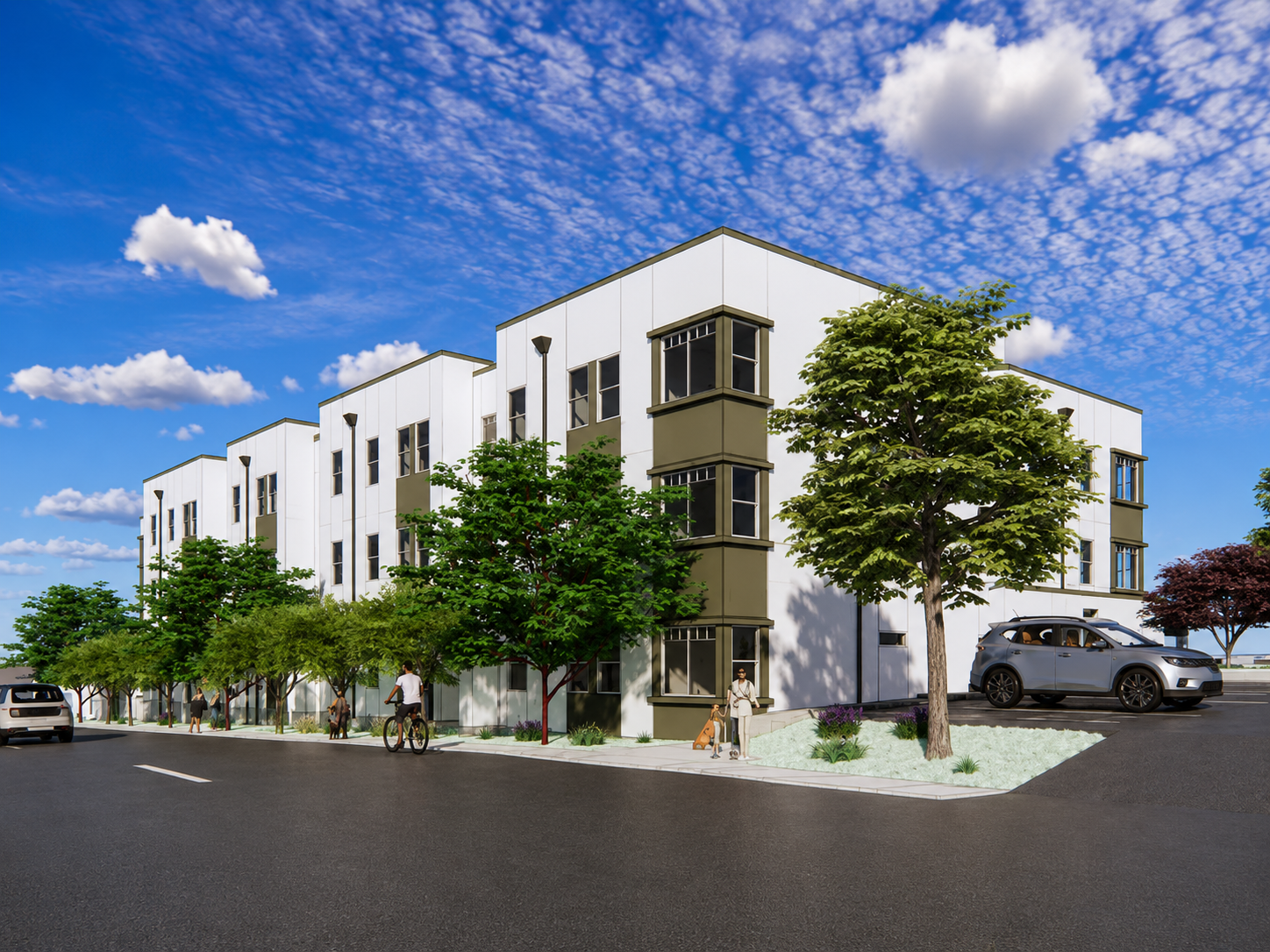 Modern multi-story residential building with trees and parked cars in front under a partly cloudy sky