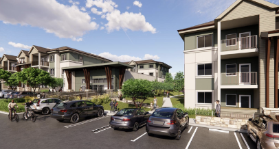 Modern residential apartment complex with parking lot and landscaped greenery.