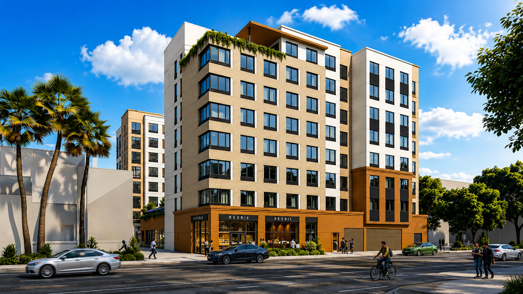 Modern multi-story apartment building with retail shops at street level, surrounded by palm trees and people walking and biking on a city street under a blue sky with clouds.