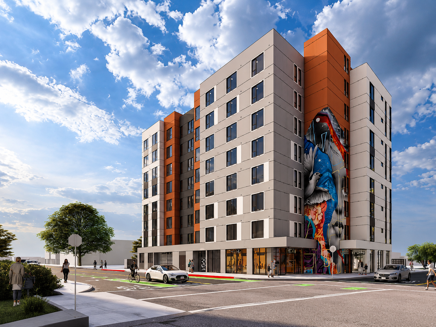 A modern multi-story building with a colorful mural of a person and birds on one side, under a blue sky with clouds, with pedestrians and cars in the surrounding area.