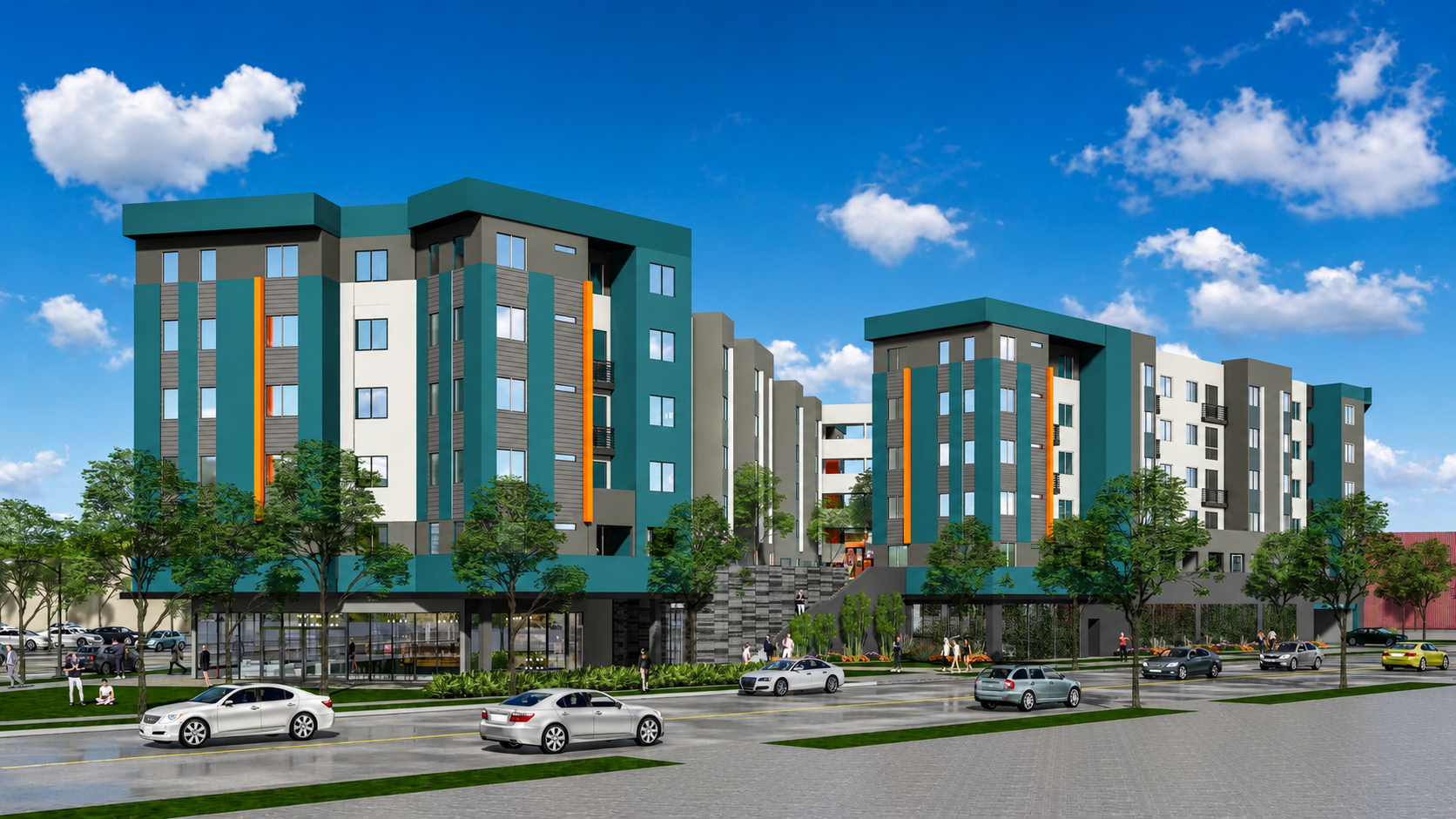 Modern mid-rise apartment buildings with glass windows, surrounded by trees and a parking lot, under a blue sky with clouds.