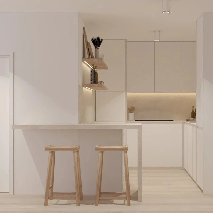 Minimalist white kitchen with two wooden barstools, open shelves with decor, and under-cabinet lighting.
