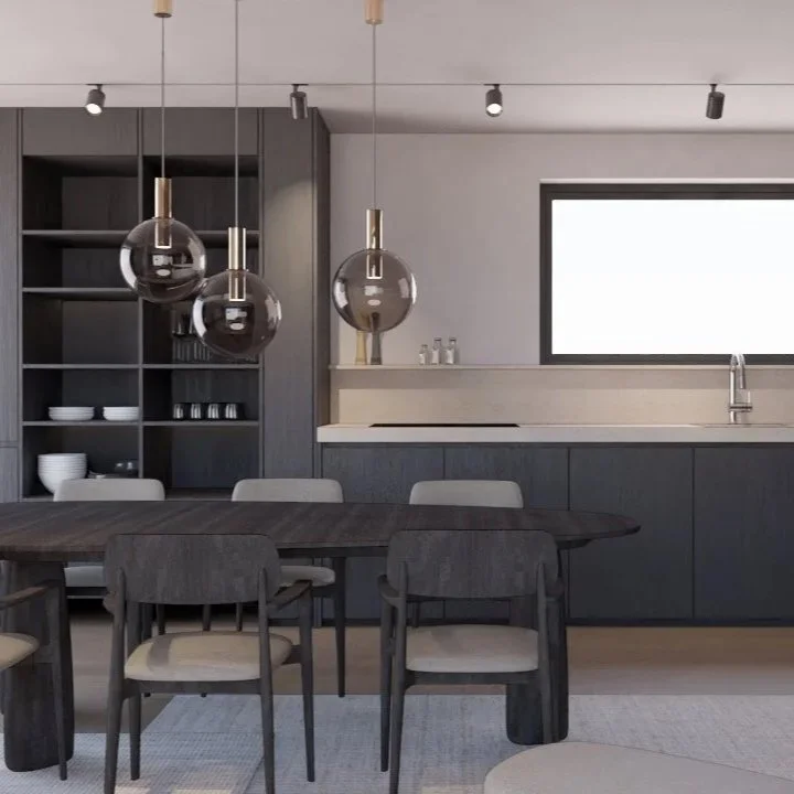 Návrh interiéru bytu v Praze na ulici Košická. Minimalistická kuchyně pracující s kontrastem tmavého dřeva a světlé pracovní plochy. Čisté linie, integrované úložné prostory a jemné bodové osvětlení podporují klidnou atmosféru a funkční uspořádání pr