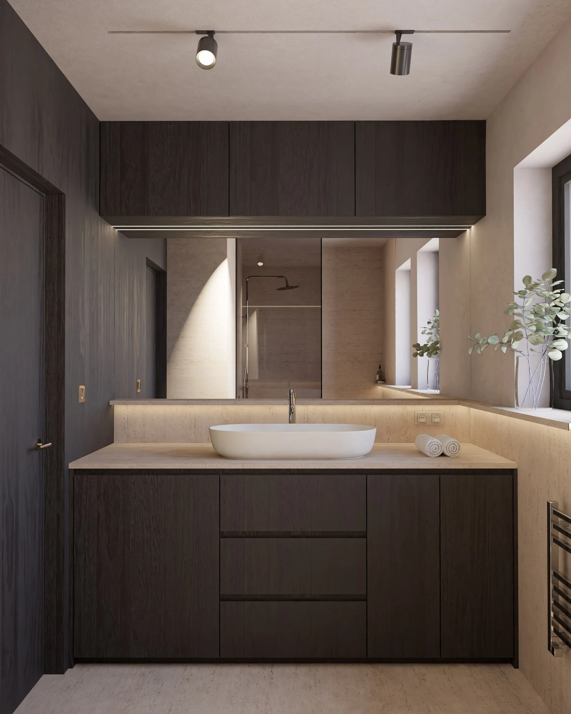 Modern bathroom with dark wood cabinetry, a white vessel sink, beige countertop, and large windows with potted plants.