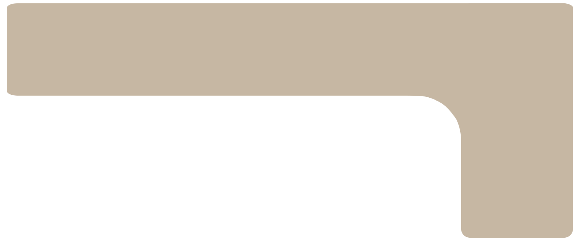 Close-up of a beige L-shaped object with a black and reflective surface underneath.