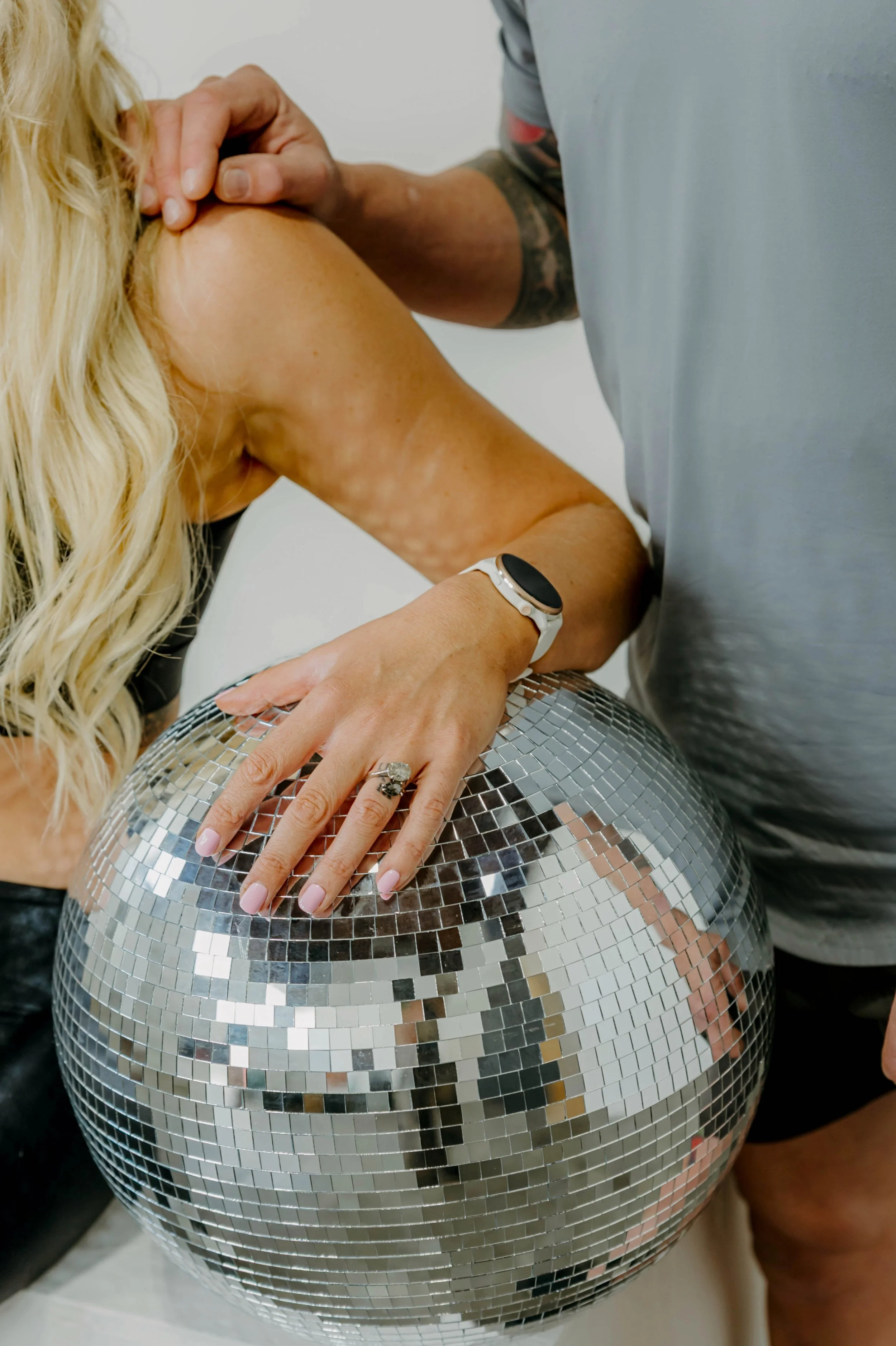 Woman's hand on disco ball