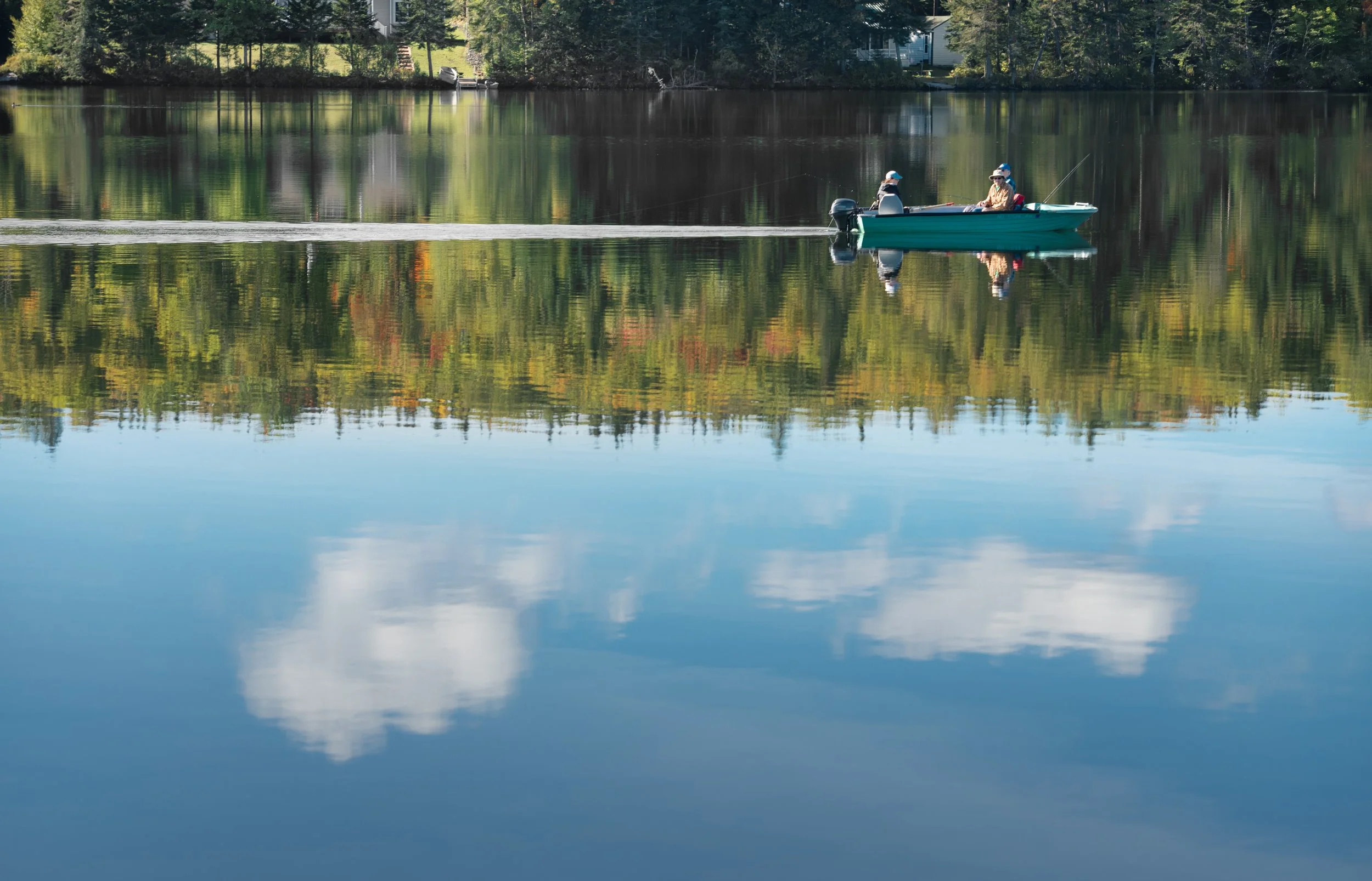 Boat on lake in New Hampshire, USA