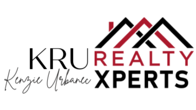 A logo for KRU Realty REALTY XPERTS featuring black and red text and a stylized house outline.
