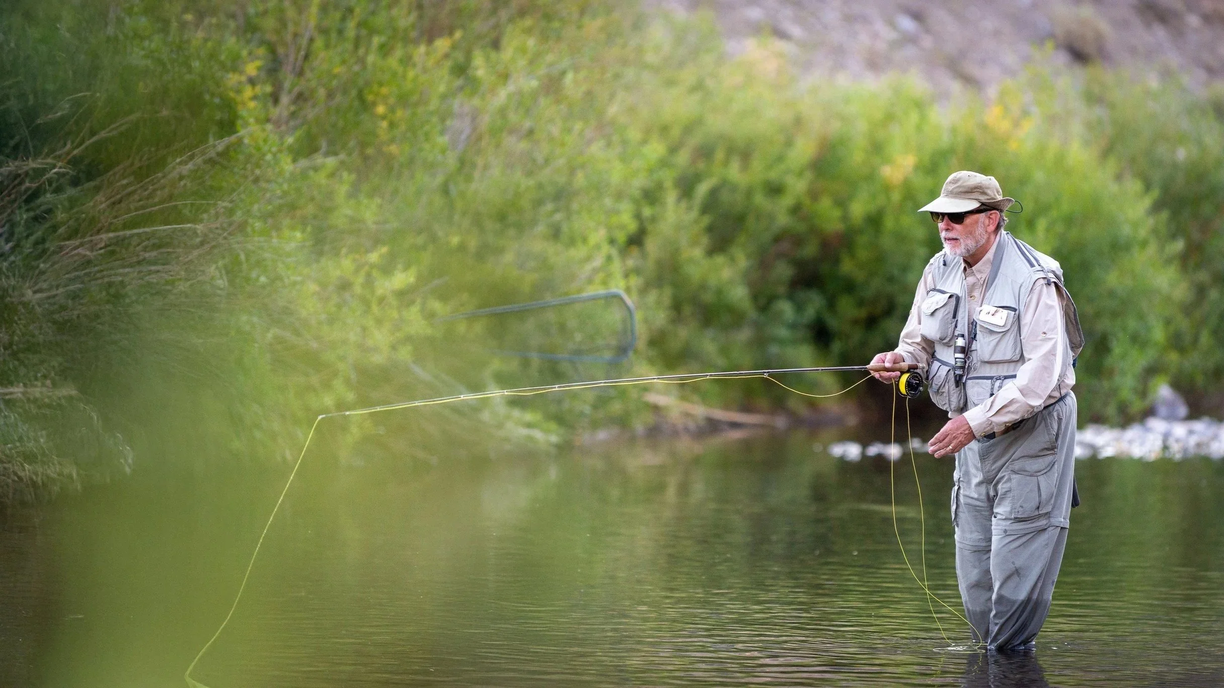 Man fly fishing in Idaho stream