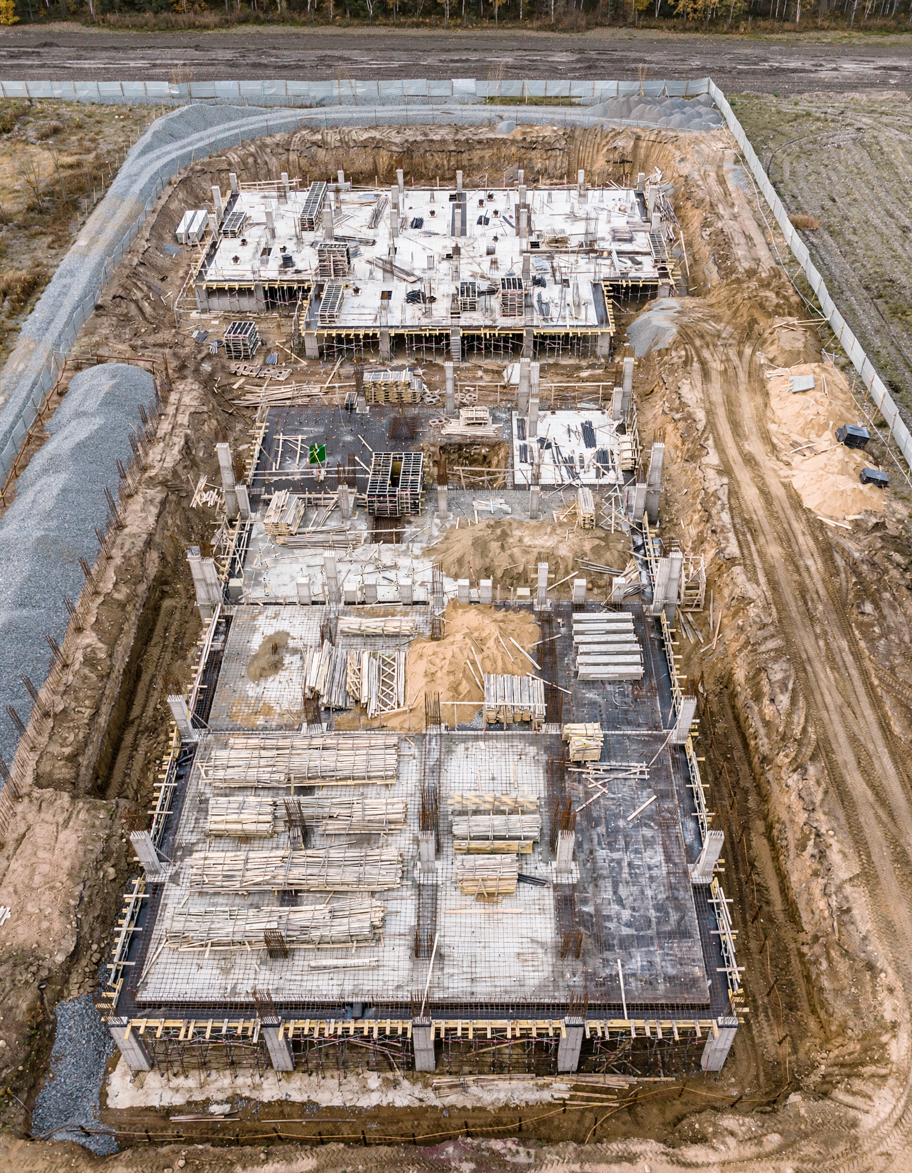 Aerial drone inspection of an active construction site for progress tracking, safety documentation, and project oversight