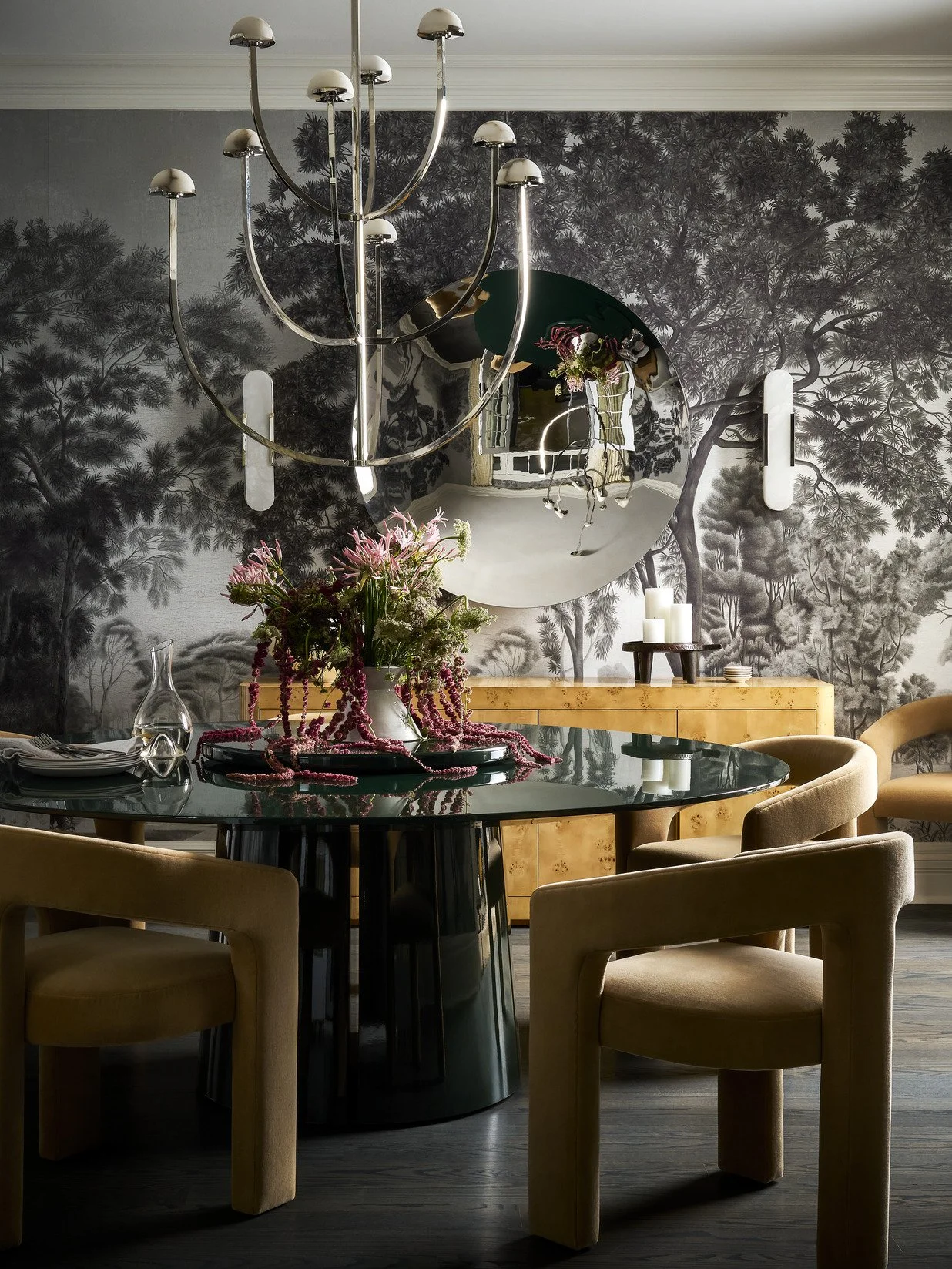 Formal dining room with statement chandelier and round mirror in Kenilworth interior project.
