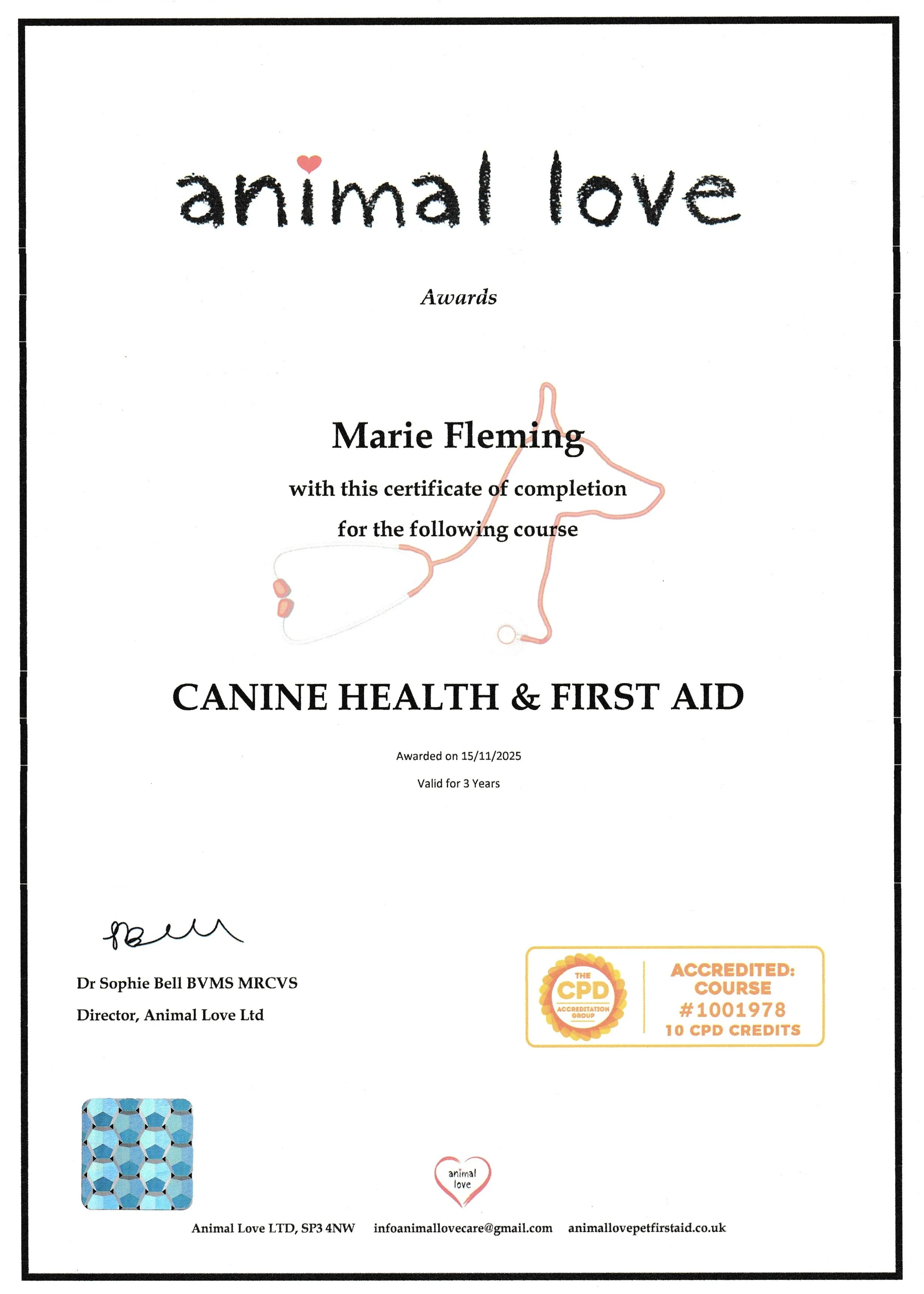 Certificate of completion for a course in canine health and first aid awarded to Marie Fleming by Animal Love Ltd, with a hand-drawn image of a dog, an accreditation badge, and contact information.