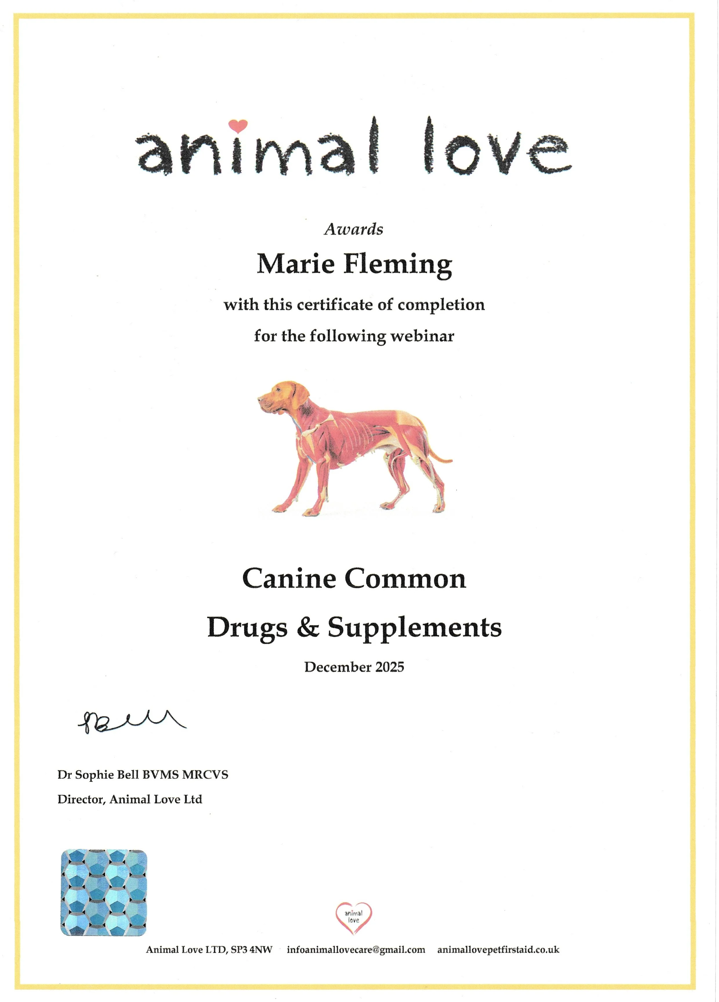 A certificate of completion awarded to Marie Fleming by Animal Love for a webinar on common drugs and supplements for canines, dated December 2025. The certificate features a cartoon-style illustration of a dog showing internal anatomy, a gold border
